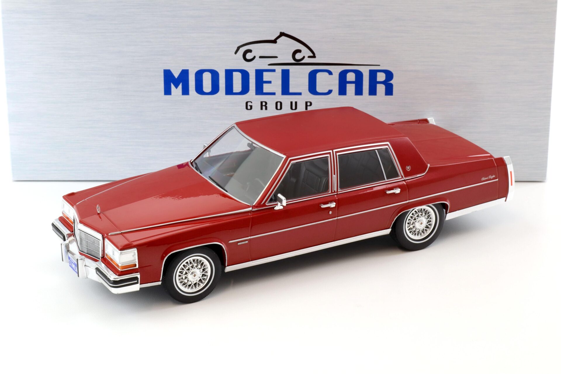1:18 MCG 1982 Cadillac Fleetwood Brougham dark red metallic