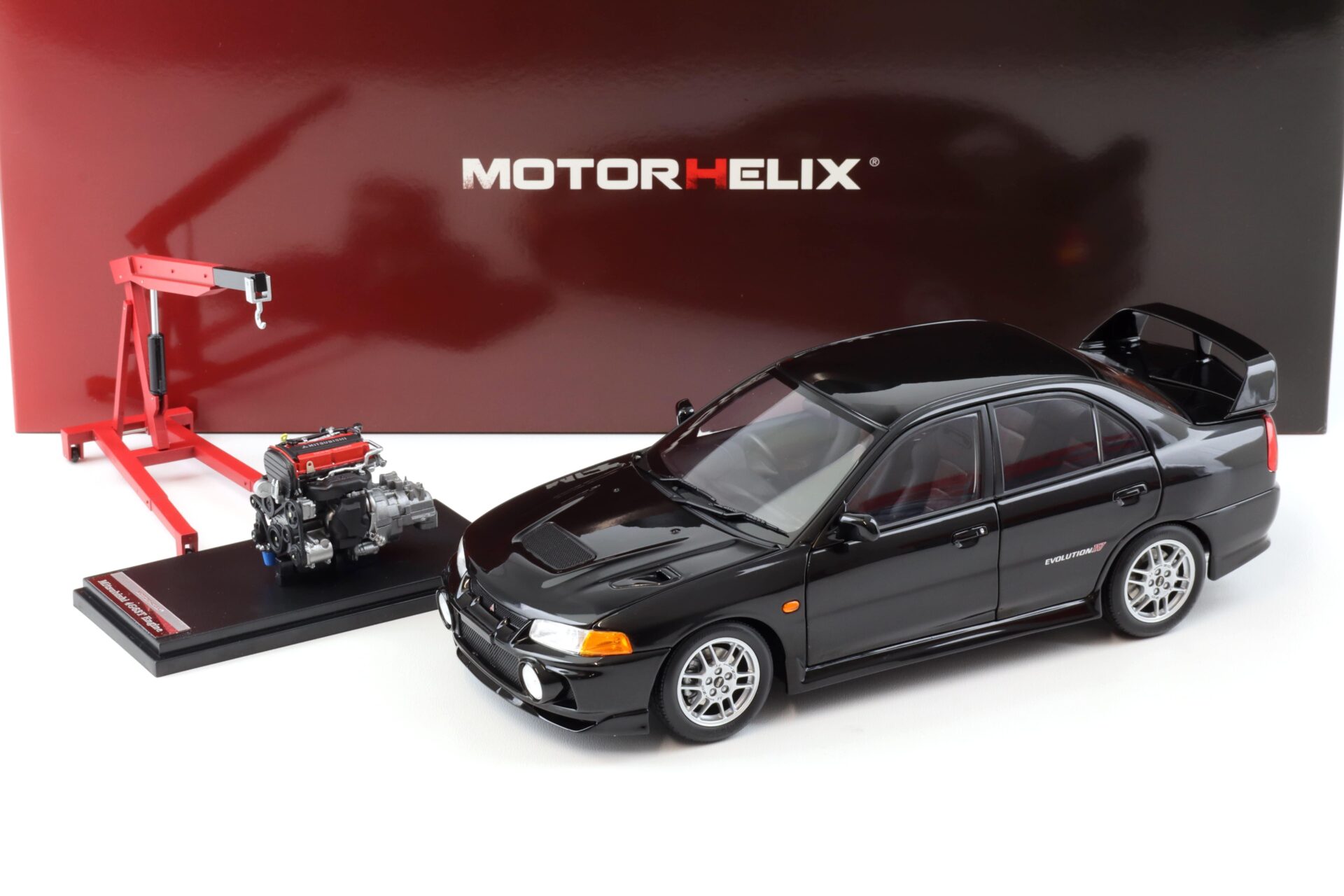 1:18 Motorhelix Mitsubishi Lancer EVO 4 IV Pyreness black 1999 with engine M84002