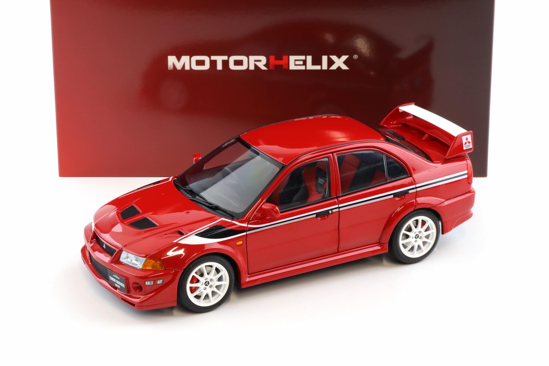 1:18 Motorhelix Mitsubishi Lancer Evolution VI (6.5) GSR T.M.E Passion red M84302