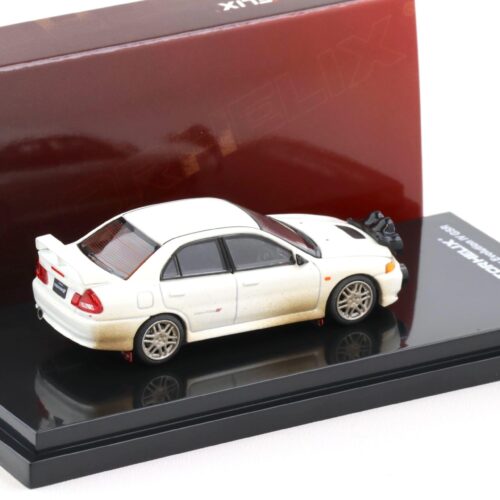 1:64 Motorhelix Mitsubishi Lancer Evolution IV GSR Muddy Version with Rally light