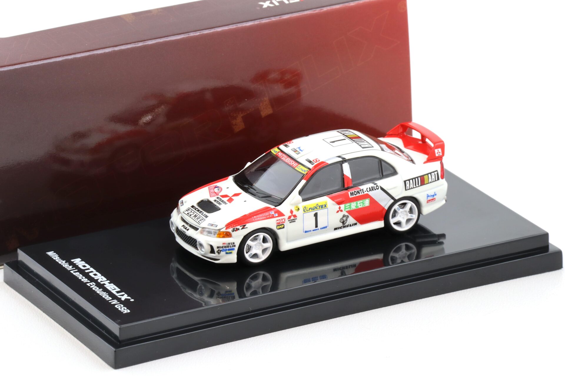 1:64 Motorhelix Mitsubishi Lancer Evolution IV GSR #1 Rally Monte Carlo