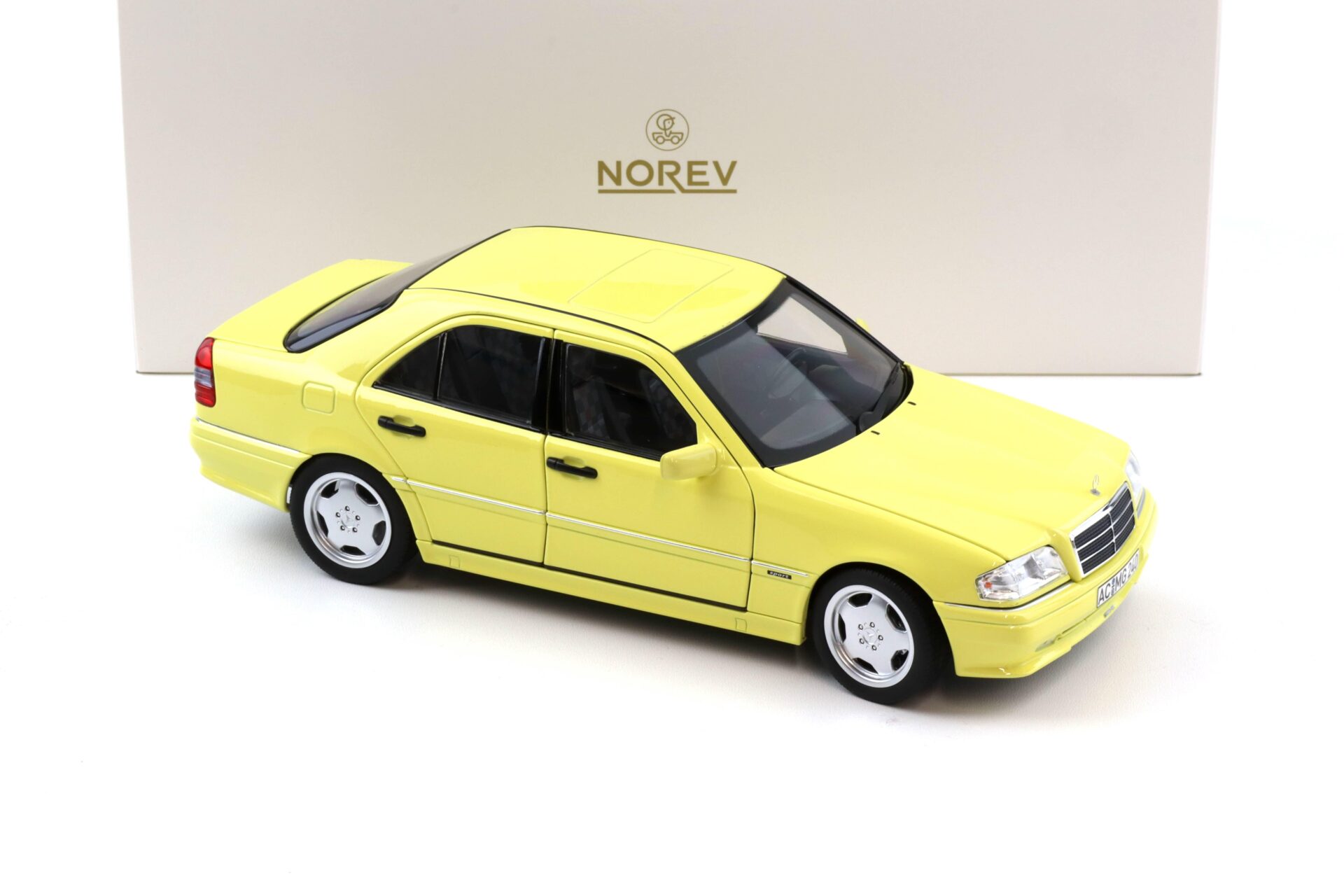 1:18 Norev Mercedes C36 AMG W202 Limousine 1993 light yellow - Limited 200 pcs.