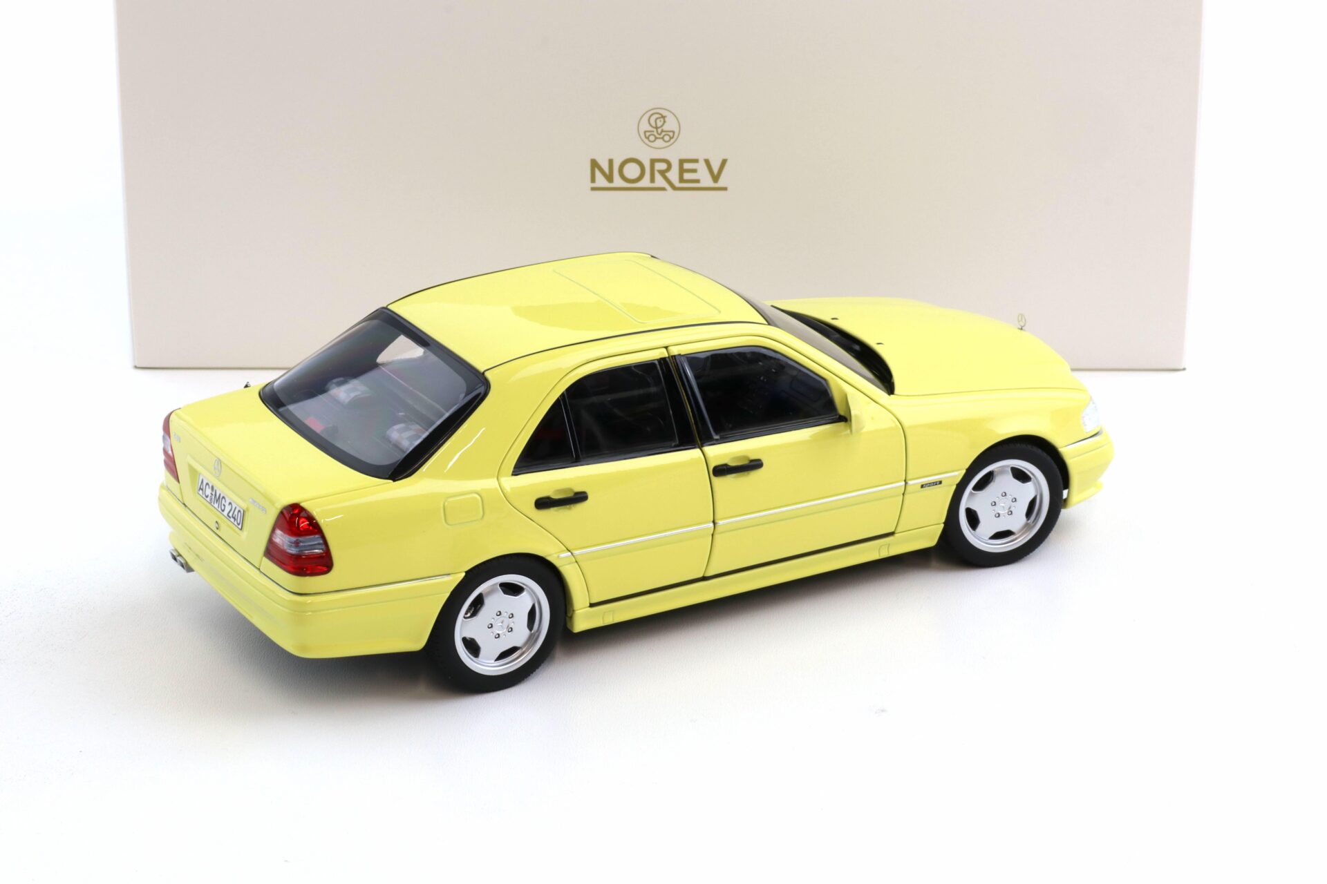 1:18 Norev Mercedes C36 AMG W202 Limousine 1993 light yellow - Limited 200 pcs.