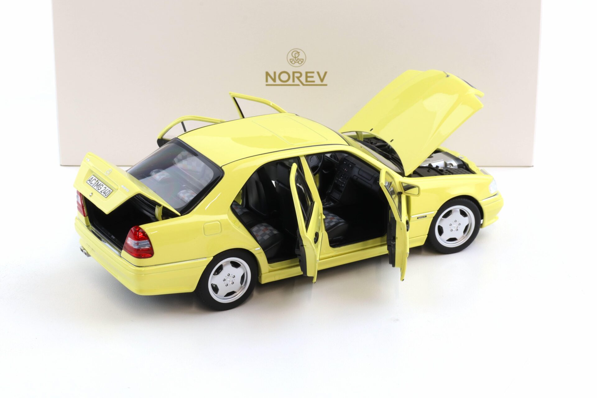 1:18 Norev Mercedes C36 AMG W202 Limousine 1993 light yellow - Limited 200 pcs.