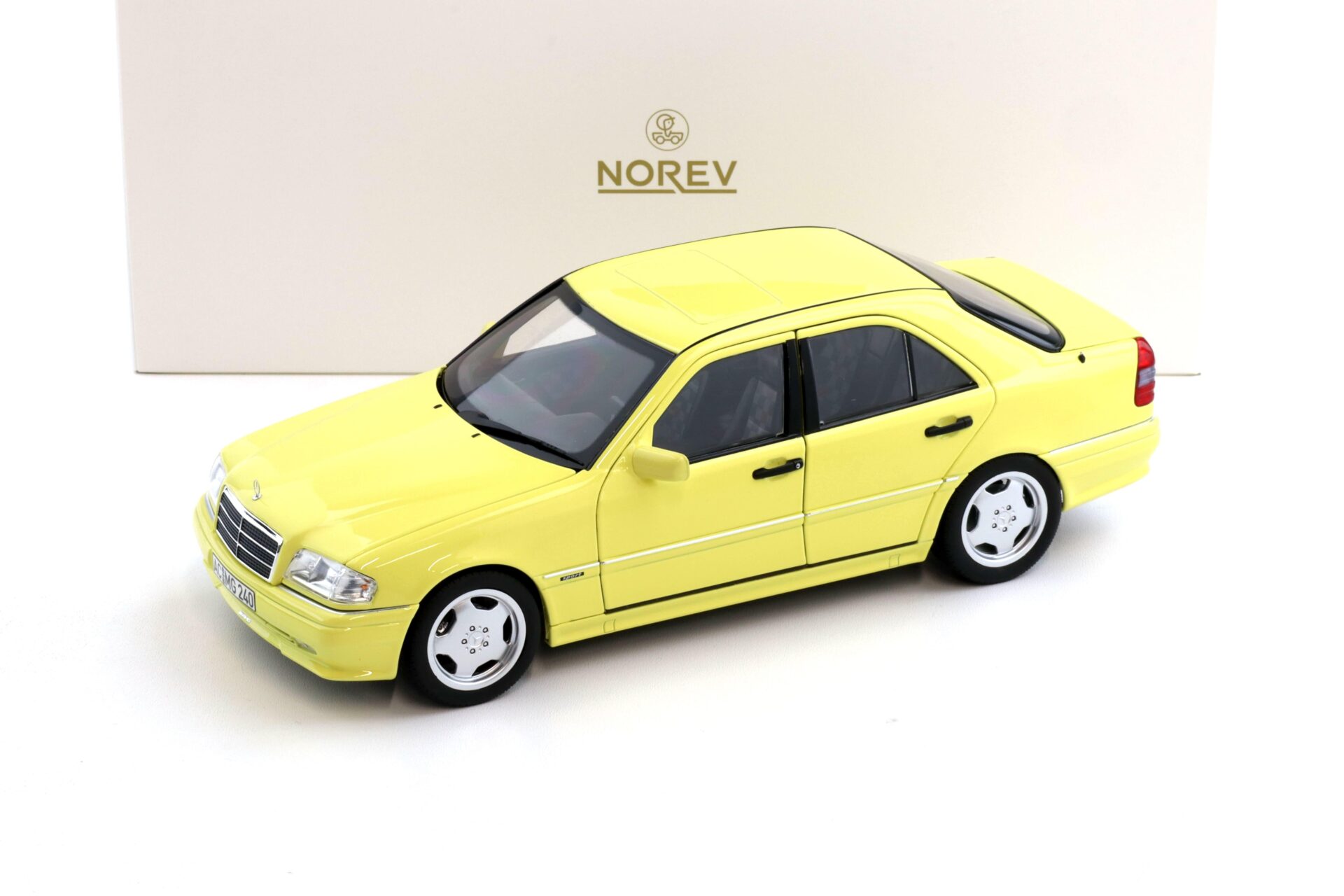 1:18 Norev Mercedes C36 AMG W202 Limousine 1993 light yellow - Limited 200 pcs.