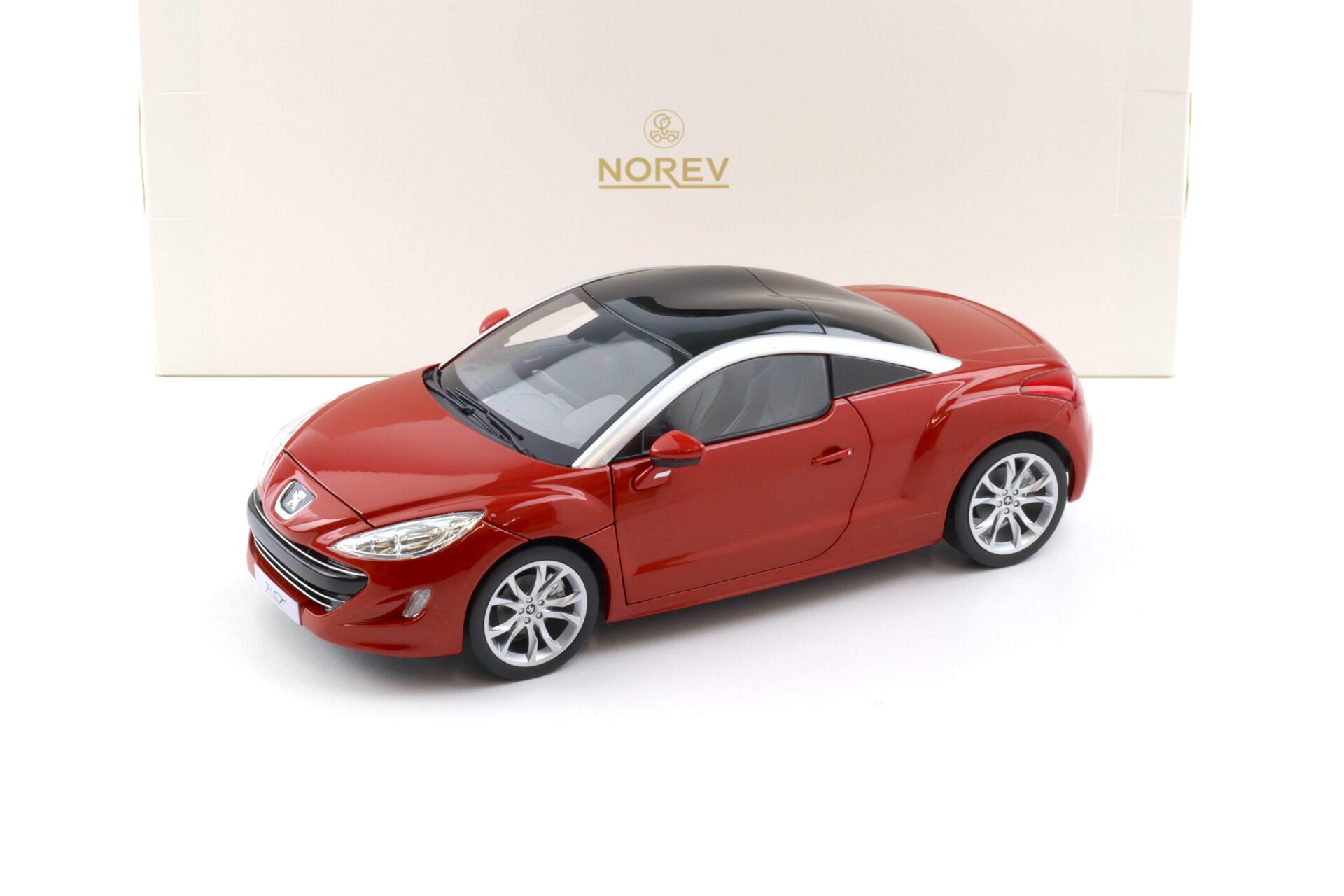 1:18 Norev Peugeot RCZ Coupe 2010 Amber red - Limited 200 pcs.