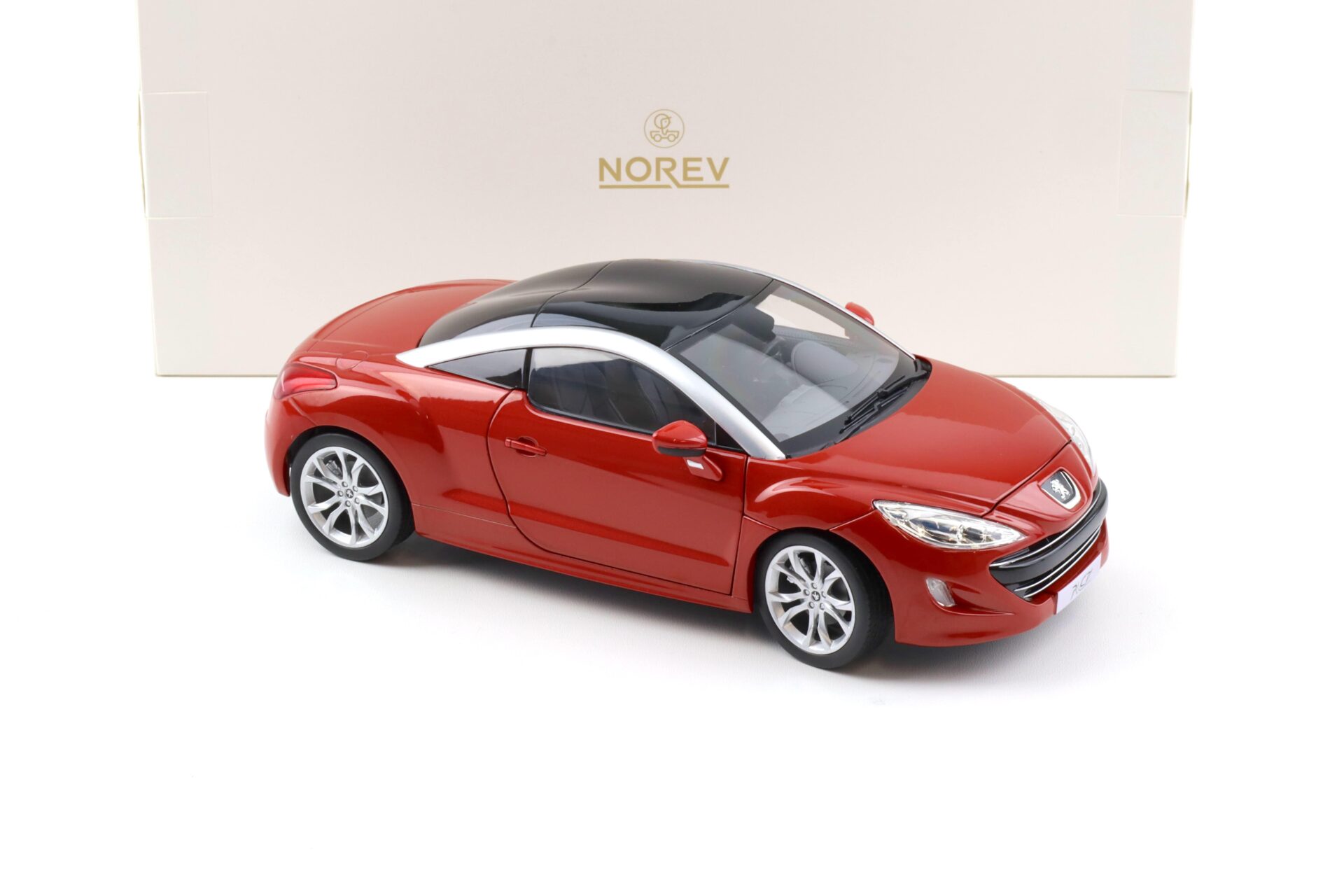 1:18 Norev Peugeot RCZ Coupe 2010 Amber red - Limited 200 pcs.