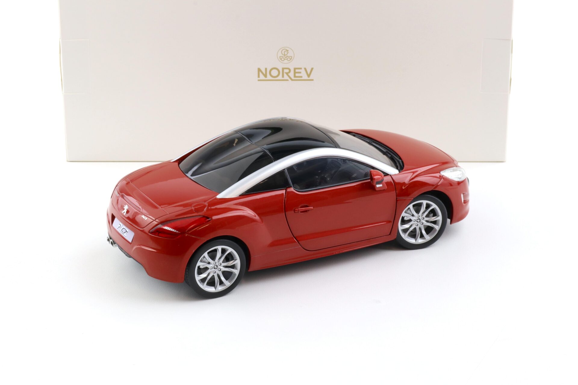 1:18 Norev Peugeot RCZ Coupe 2010 Amber red - Limited 200 pcs.