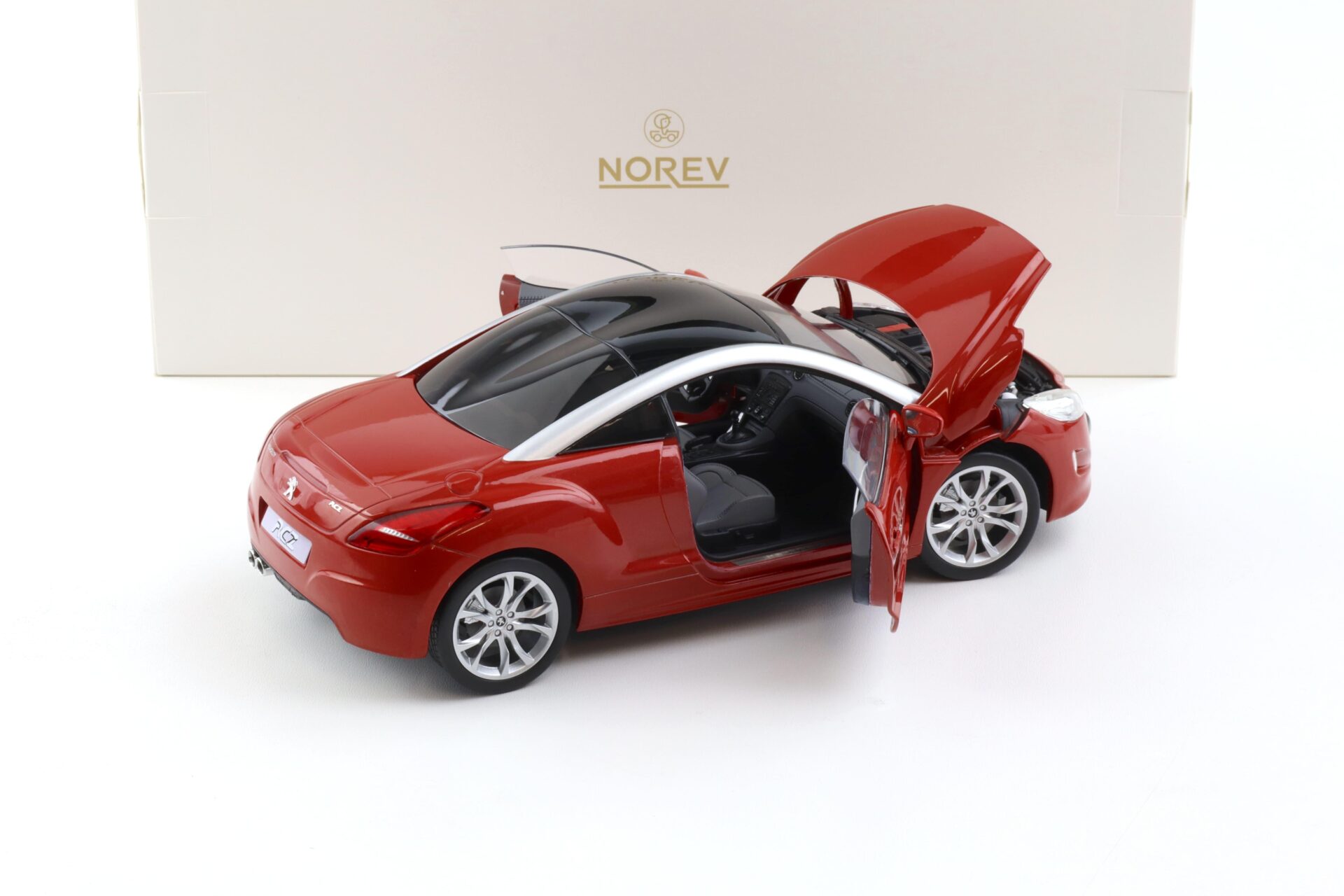 1:18 Norev Peugeot RCZ Coupe 2010 Amber red - Limited 200 pcs.
