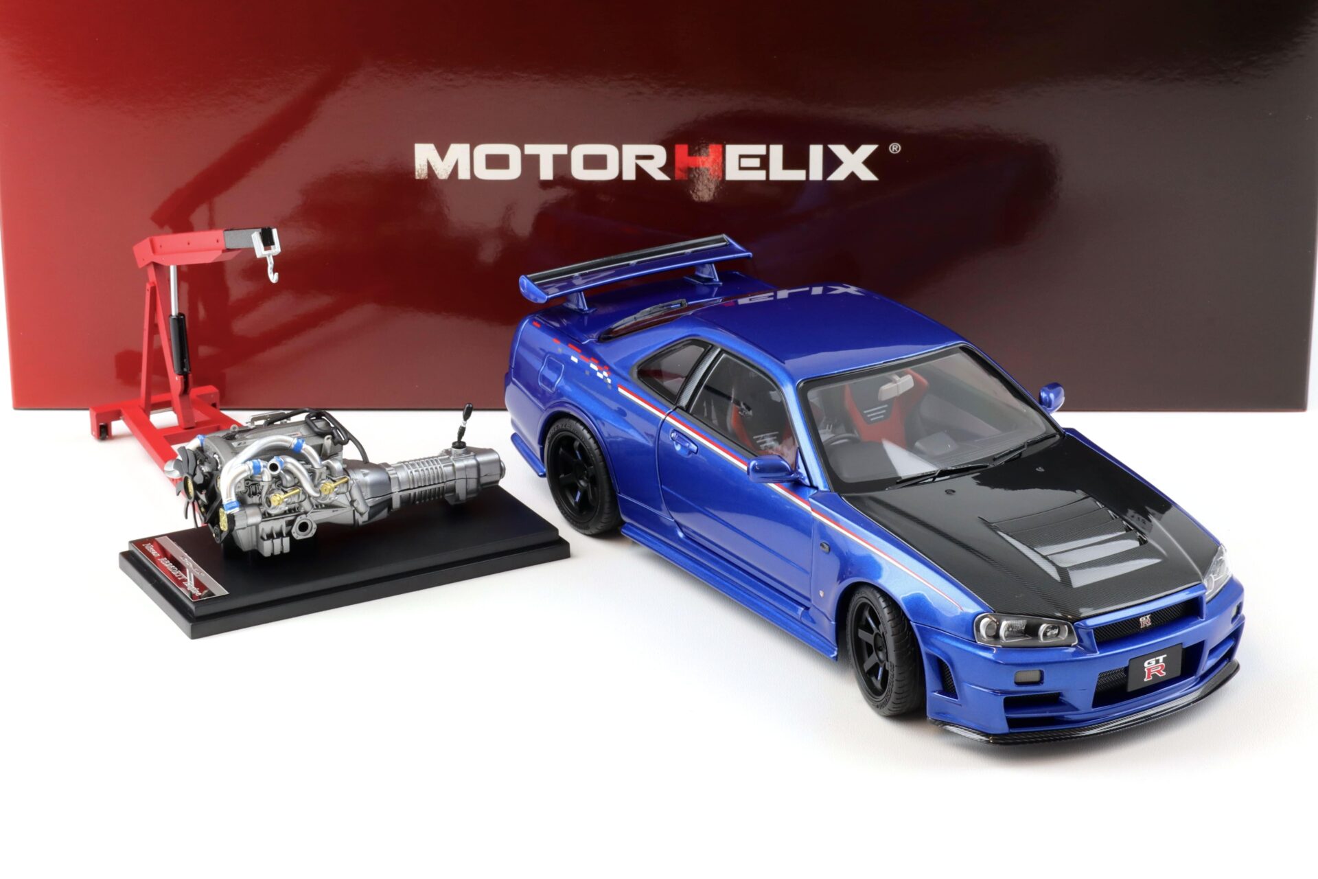 1:18 Motorhelix Nissan Skyline GT-R R34 Nismo CRS Bayside blue/ Carbon hood M83430