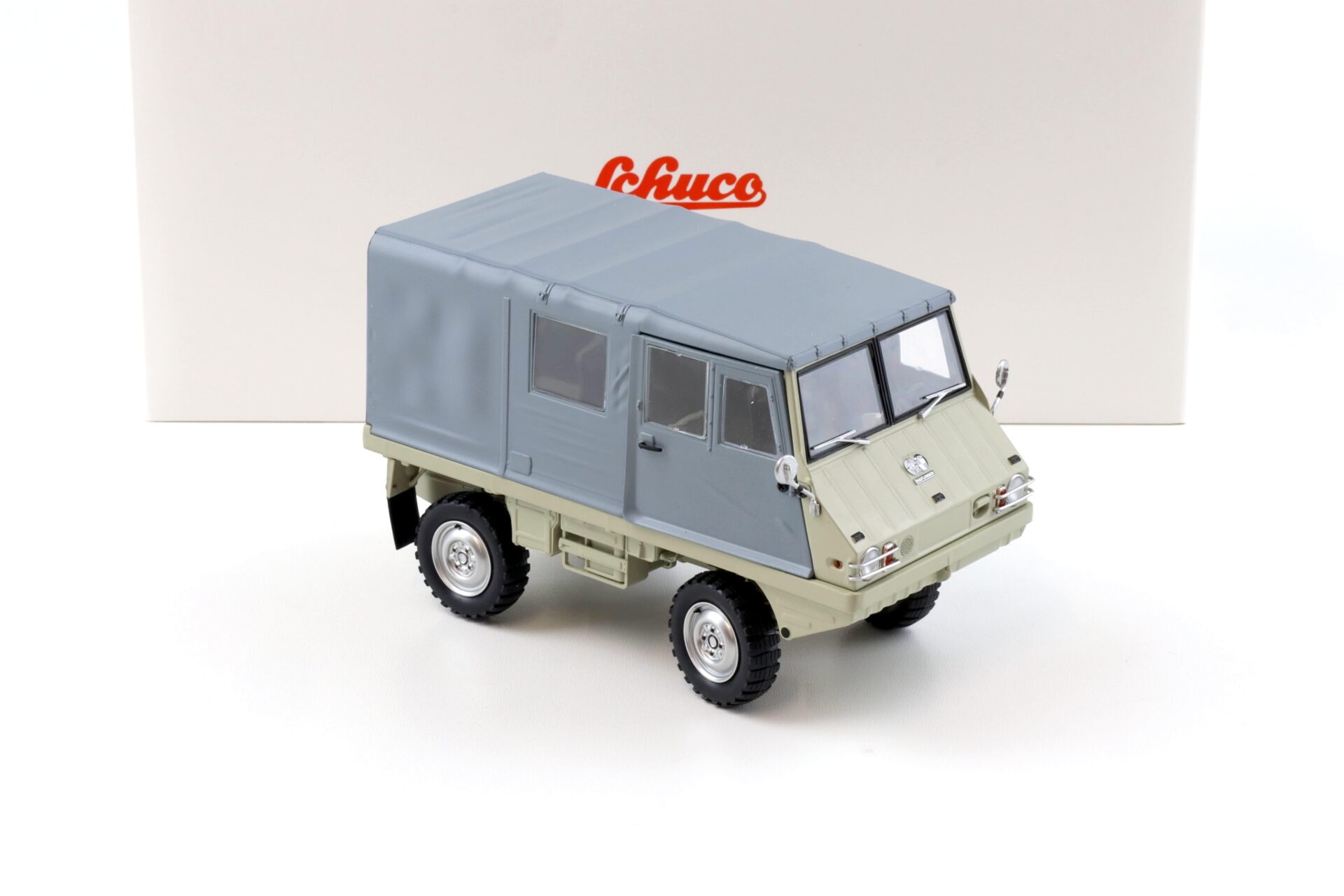 1:18 Schuco Styr-Puch Halfinger 4x4 beige/ grey