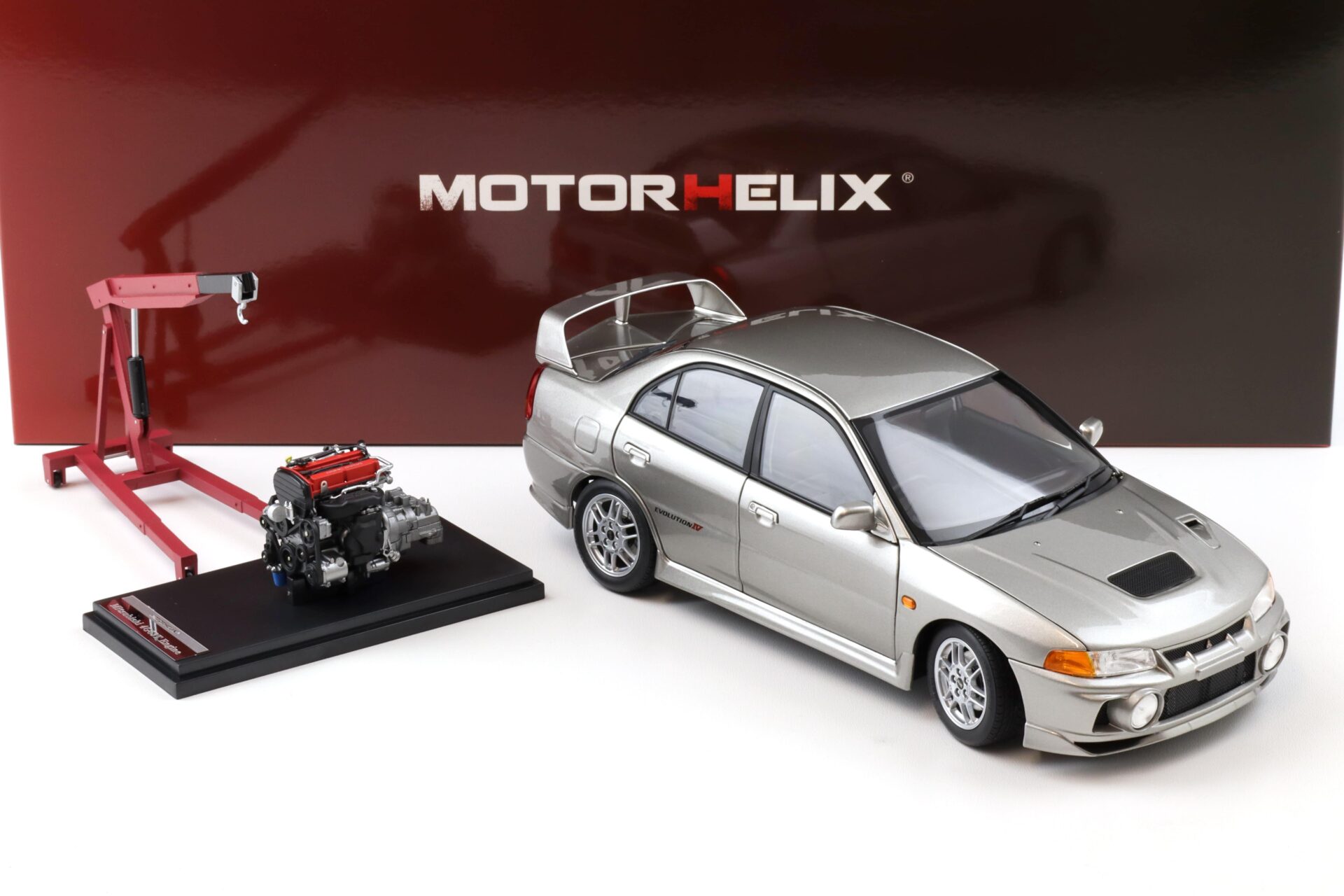 1:18 Motorhelix Mitsubishi Lancer EVO 4 IV Steel silver 1999 with engine M84001