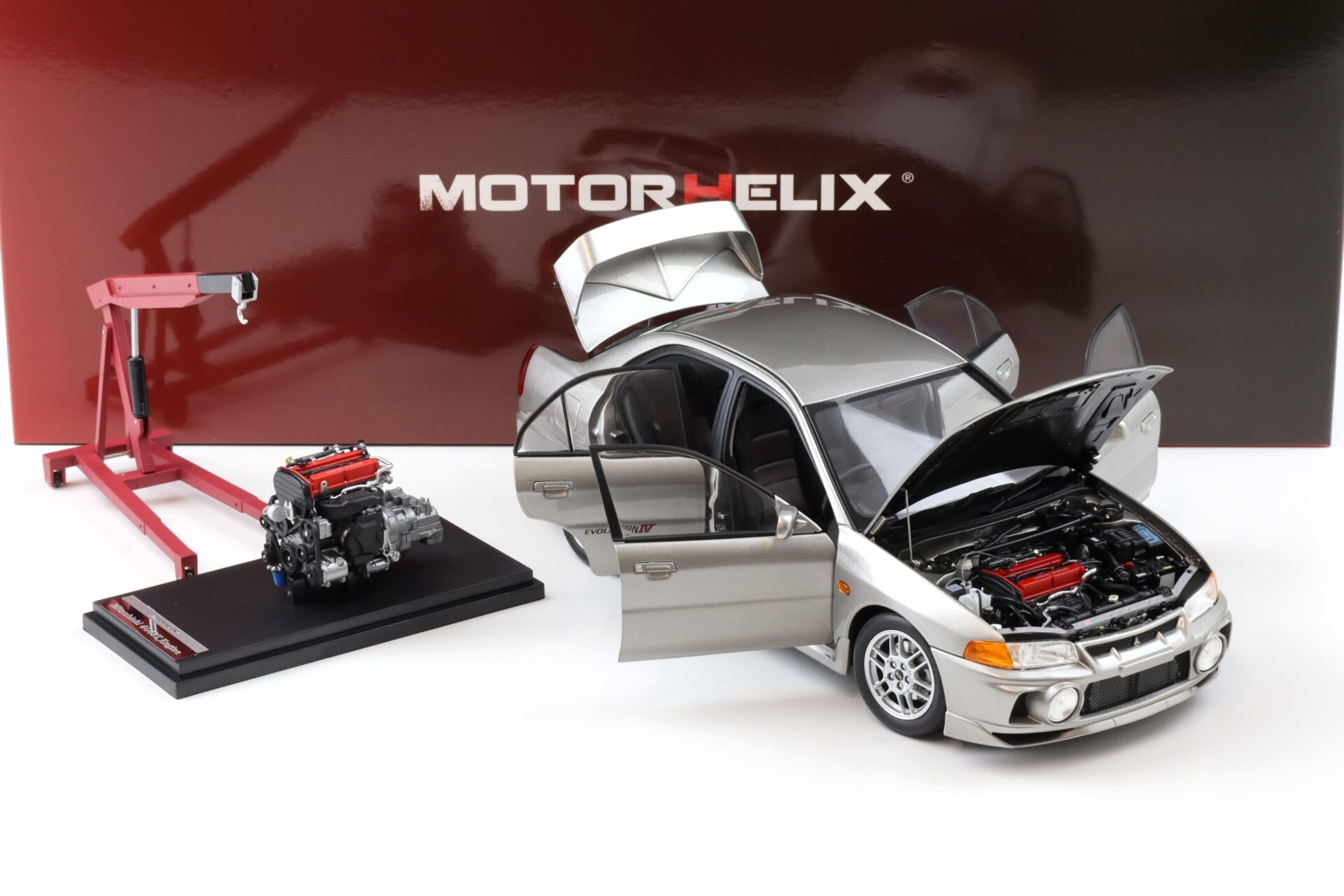 1:18 Motorhelix Mitsubishi Lancer EVO 4 IV Steel silver 1999 with engine M84001