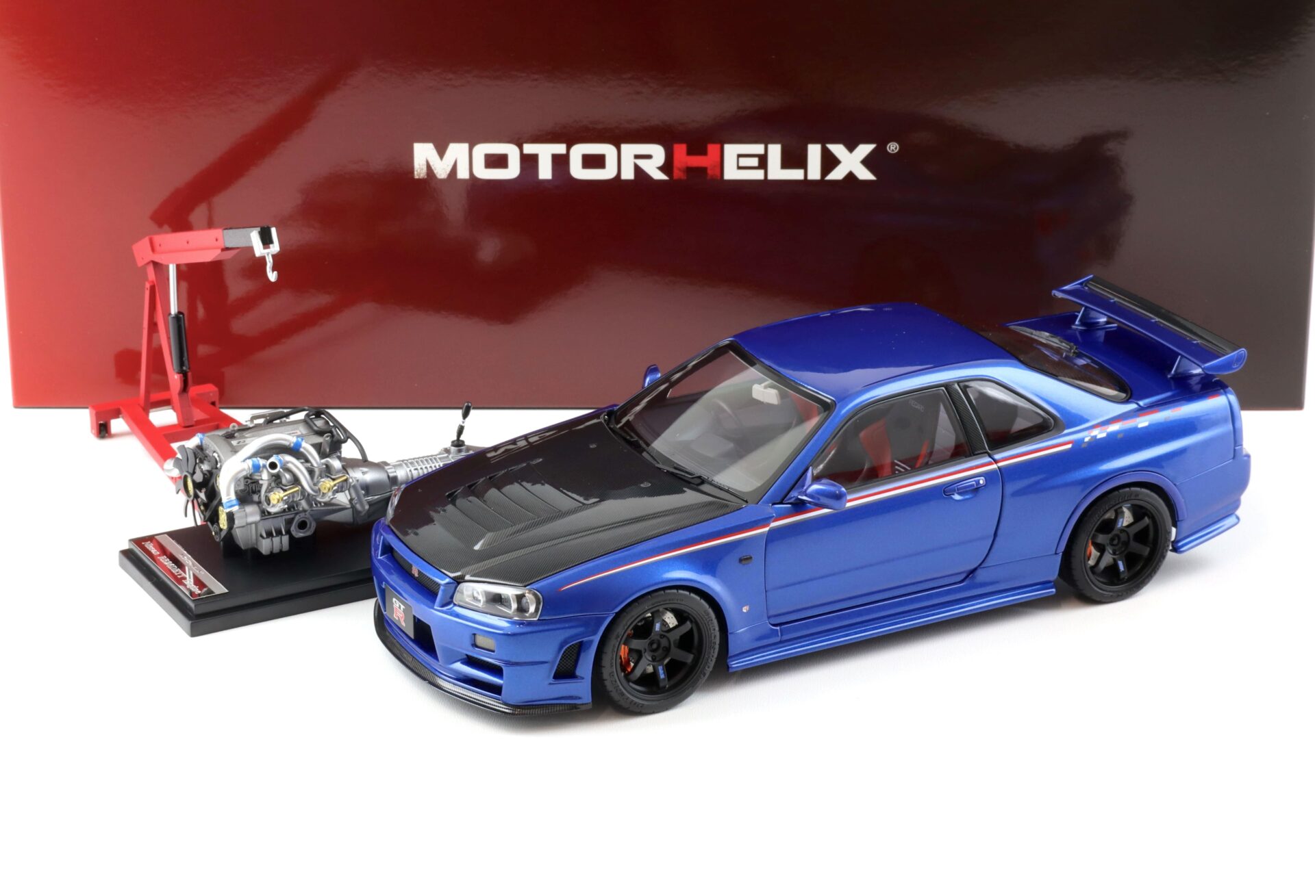 ID 100952 orig 2.jpg 1:18 Motorhelix Nissan Skyline GT-R R34 Nismo CRS Bayside blue/ Carbon hood M83430