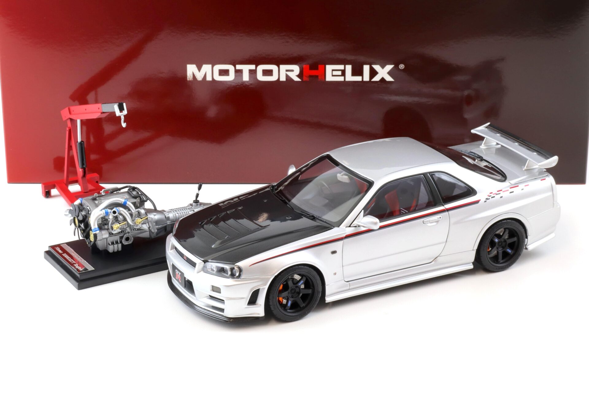 ID 100979 orig.jpg 1:18 Motorhelix Nissan Skyline GT-R R34 Nismo CRS silver/ Carbon hood M83431