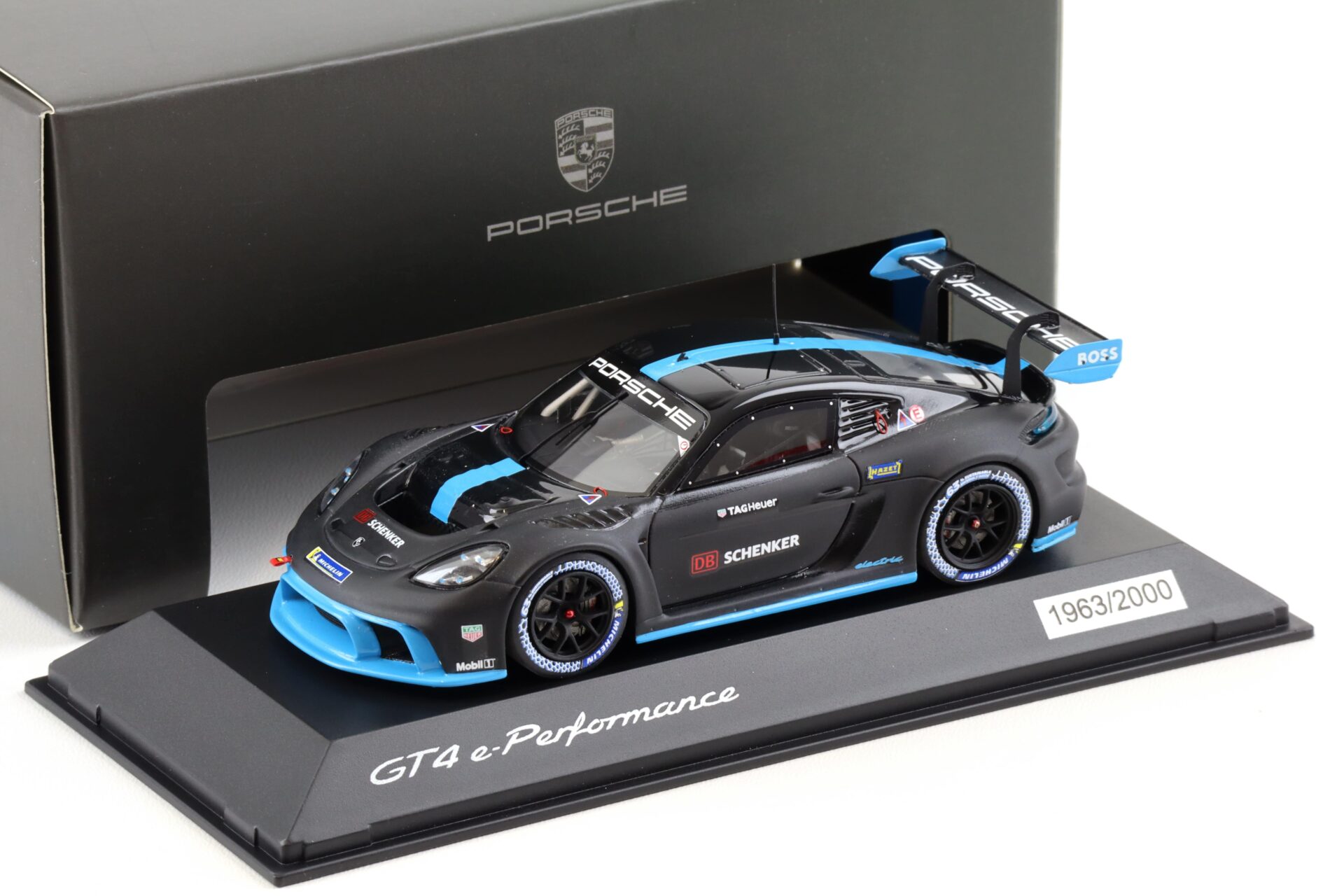 ID 101519 orig.jpg 1:43 Spark Porsche Cayman GT4 e-Performance 2022 black/ blue WAP DEALER