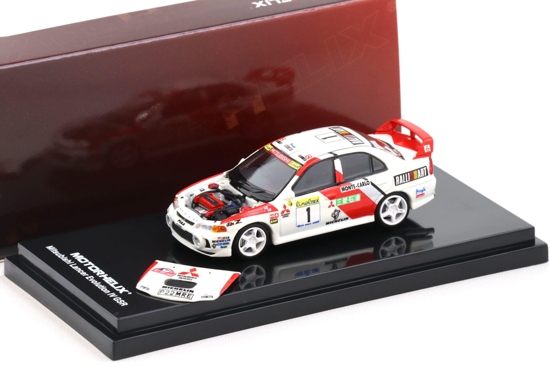 1:64 Motorhelix Mitsubishi Lancer Evolution IV GSR #1 Rally Monte Carlo