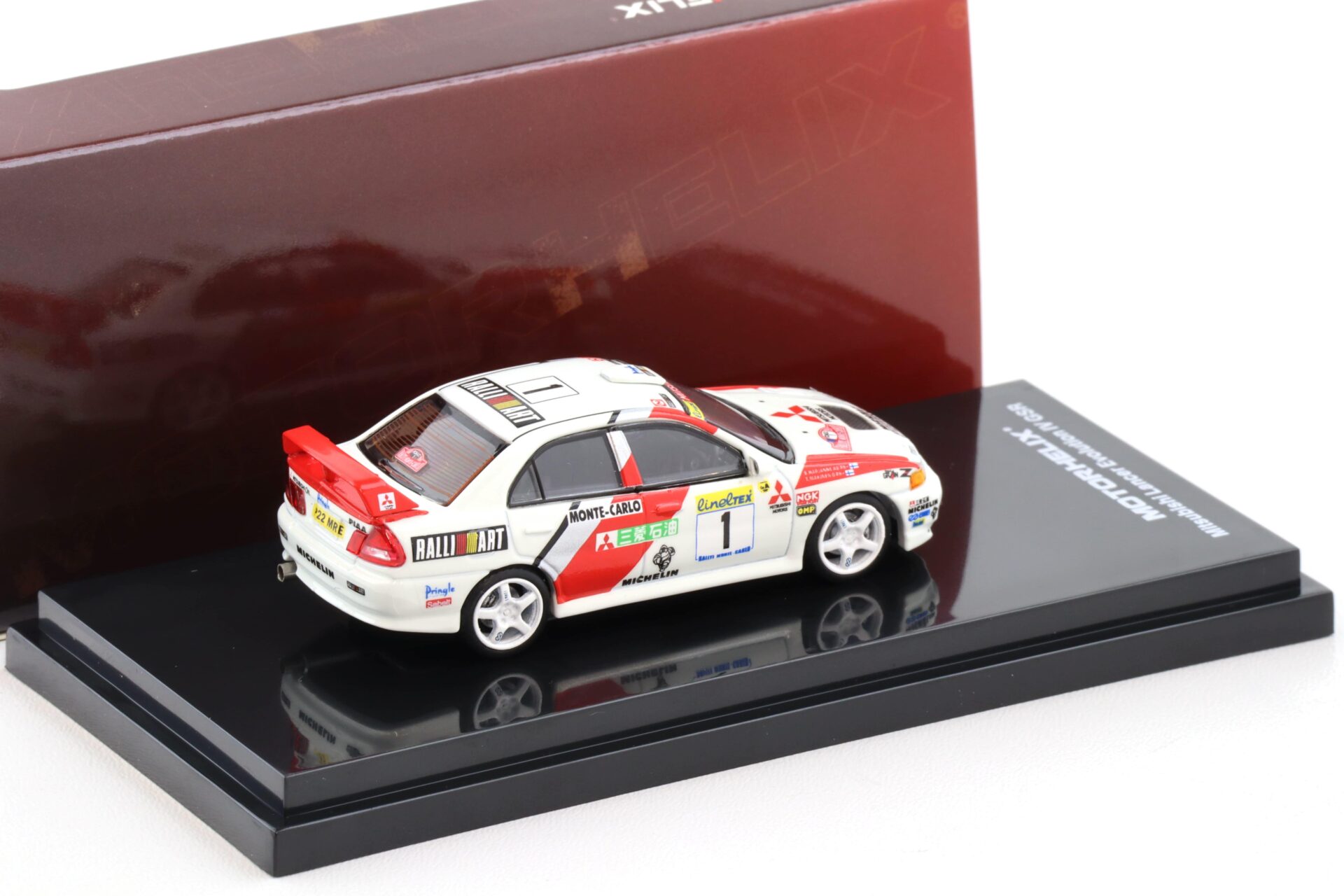 1:64 Motorhelix Mitsubishi Lancer Evolution IV GSR #1 Rally Monte Carlo