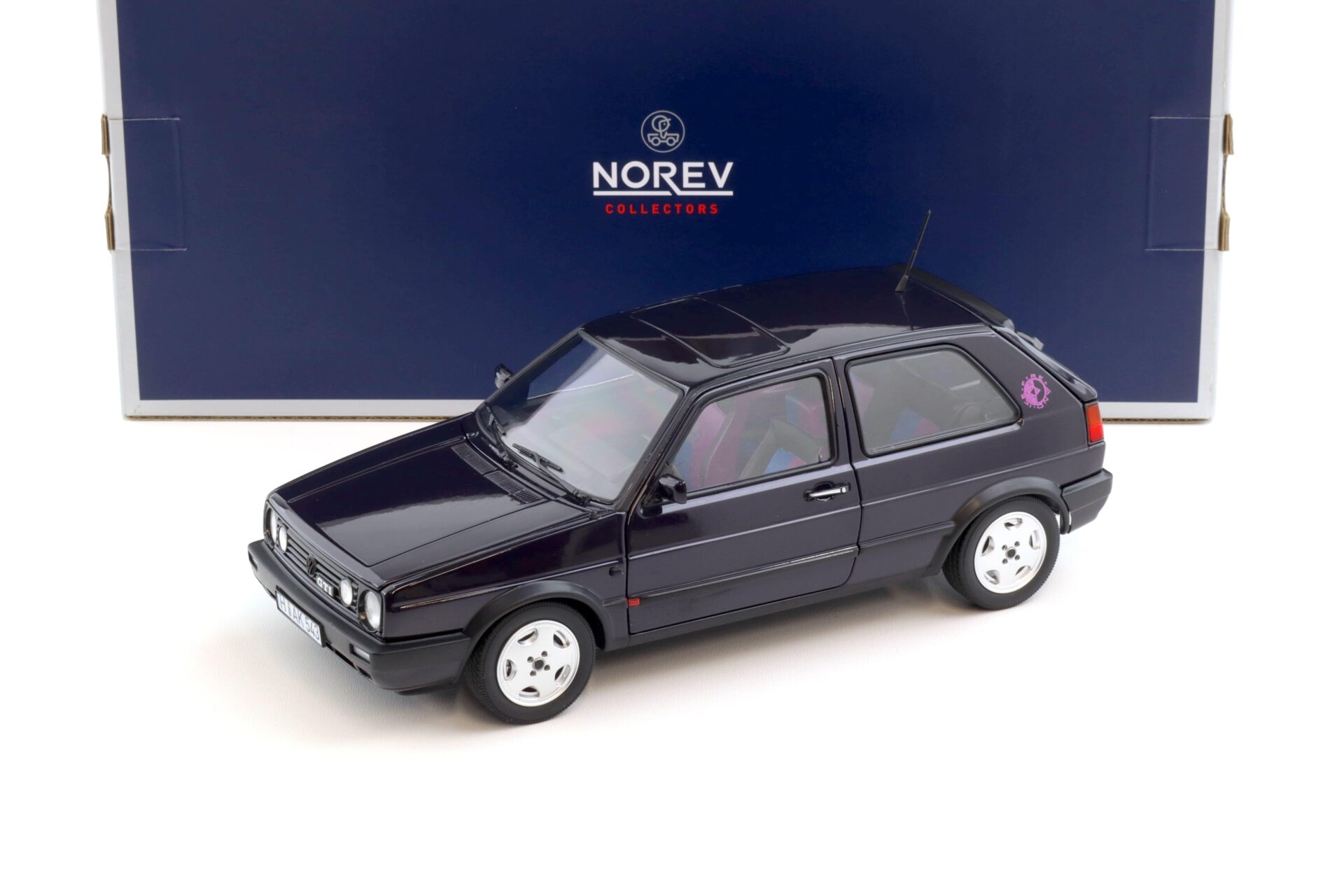 ID 108331 orig.jpg 1:18 Norev VW Golf 2 GTI Fire and Ice 1991 purple metallic 188558