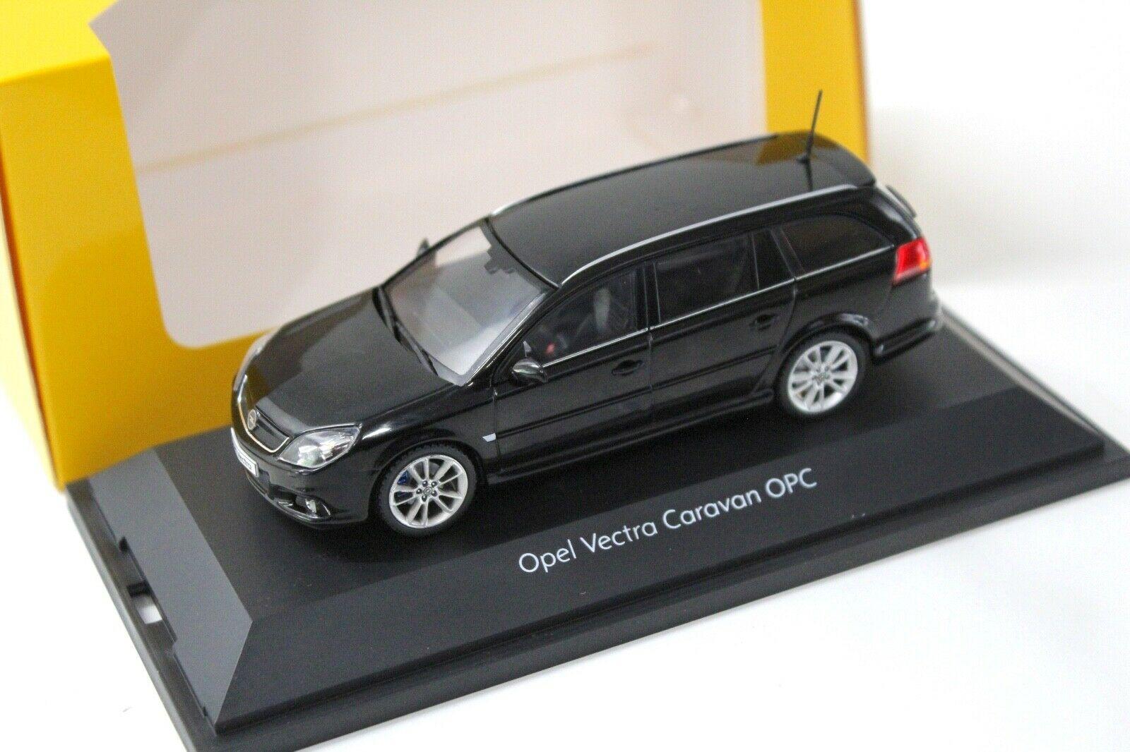ID 40805 orig.jpg 1:43 Schuco Opel Vectra OPC Caravan black DEALER VERSION