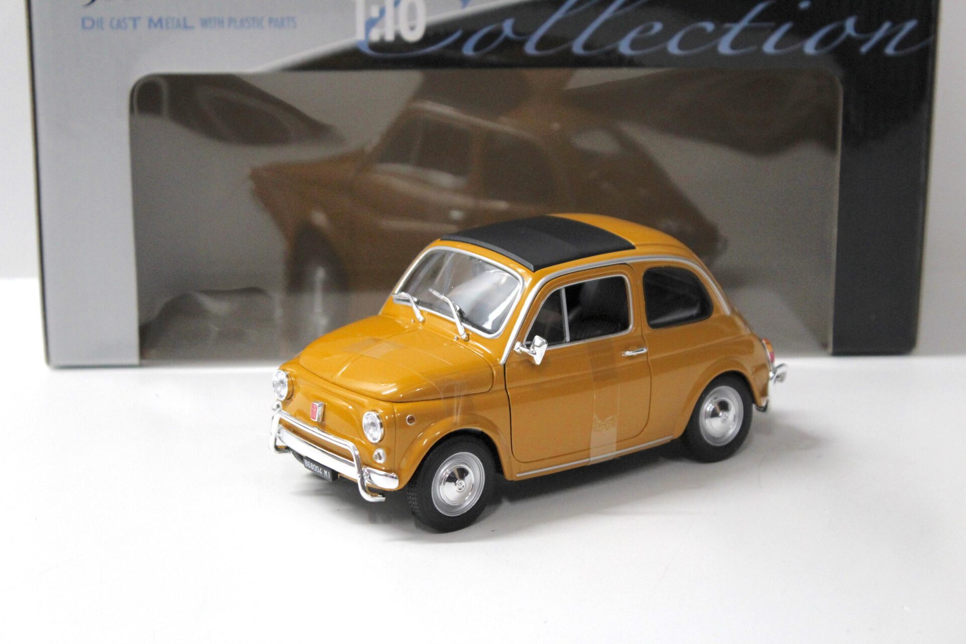 ID 43132 orig.jpg 1:18 Welly 1957 Fiat Nuova 500 ocker yellow