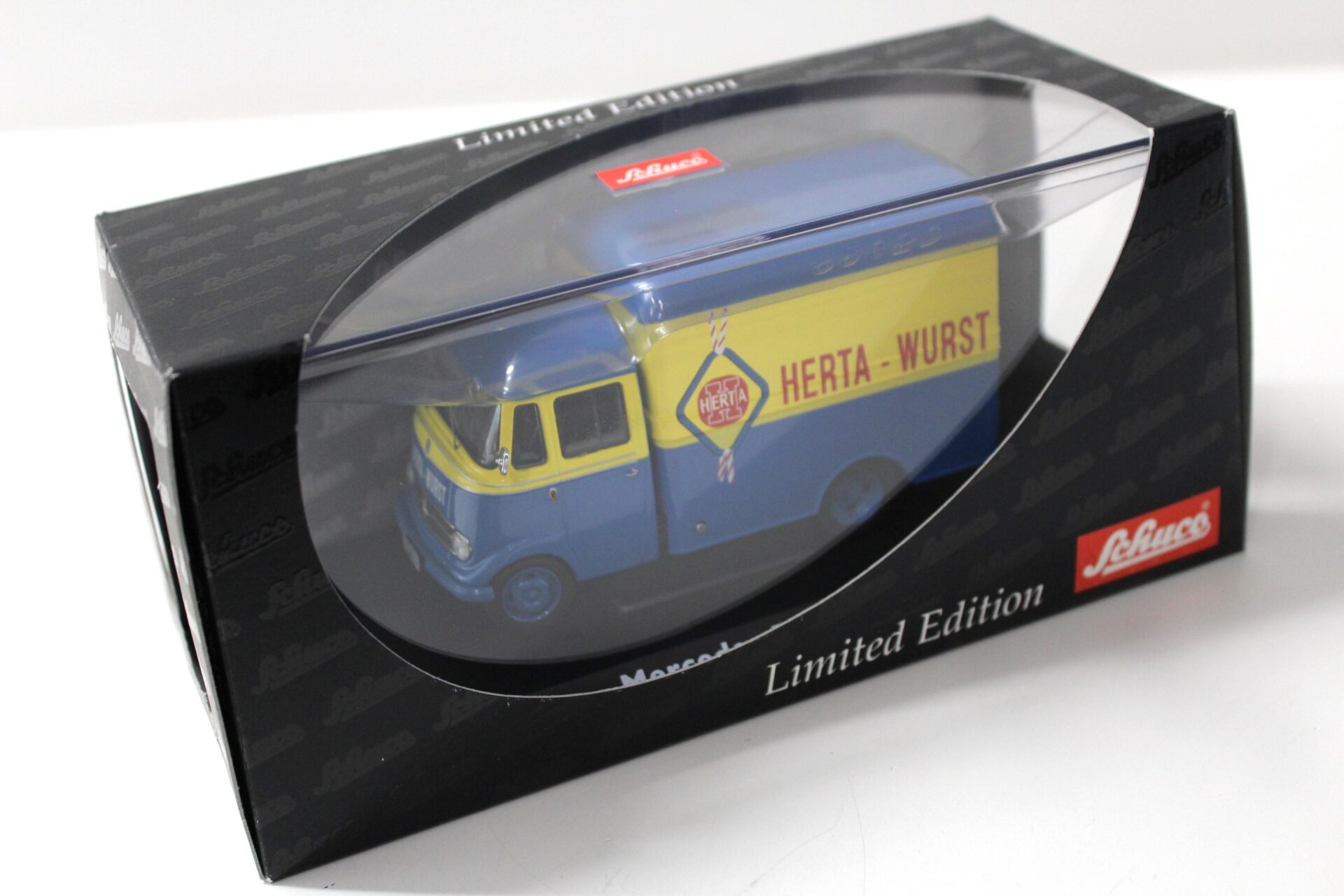 1:43 Schuco Mercedes L319 Kofferwagen "Herta-Wurst" blue/ yellow