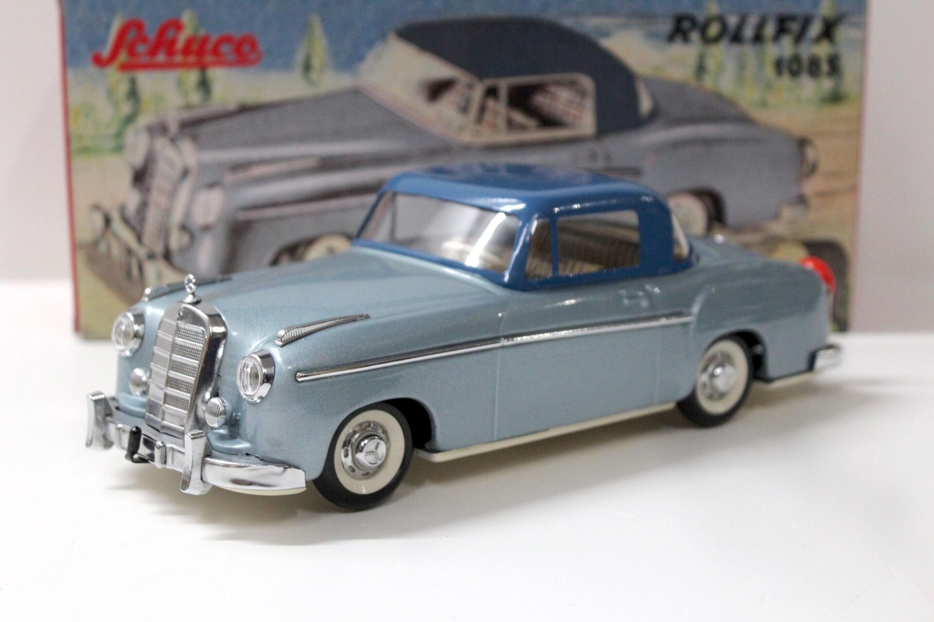 ID 53737 orig 1.jpg Schuco Rollfix 1085 Mercedes 220 S Ponton light blue metallic/ blue