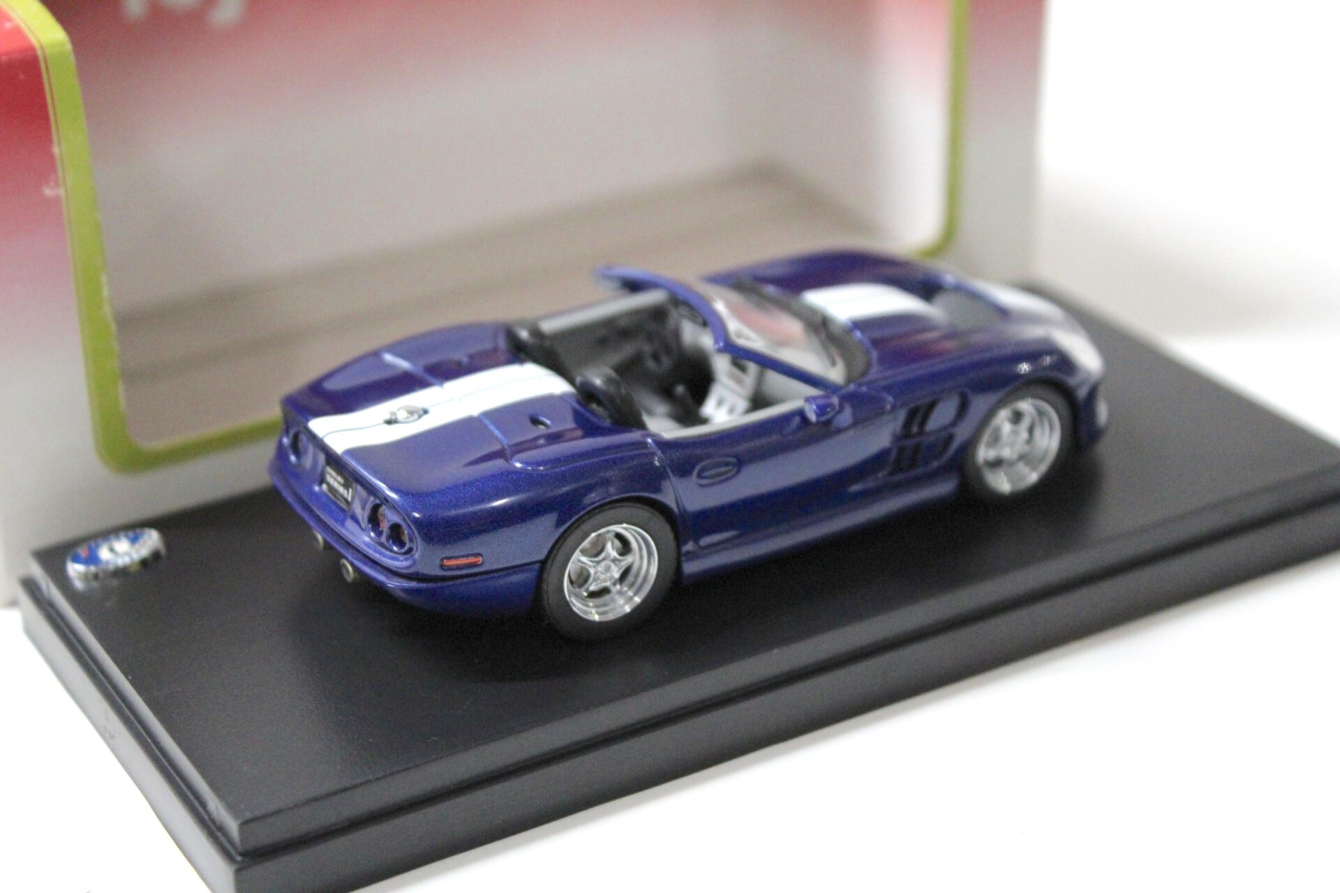 1:43 Kyosho Shelby Series 1 blue metallic/ white stripes