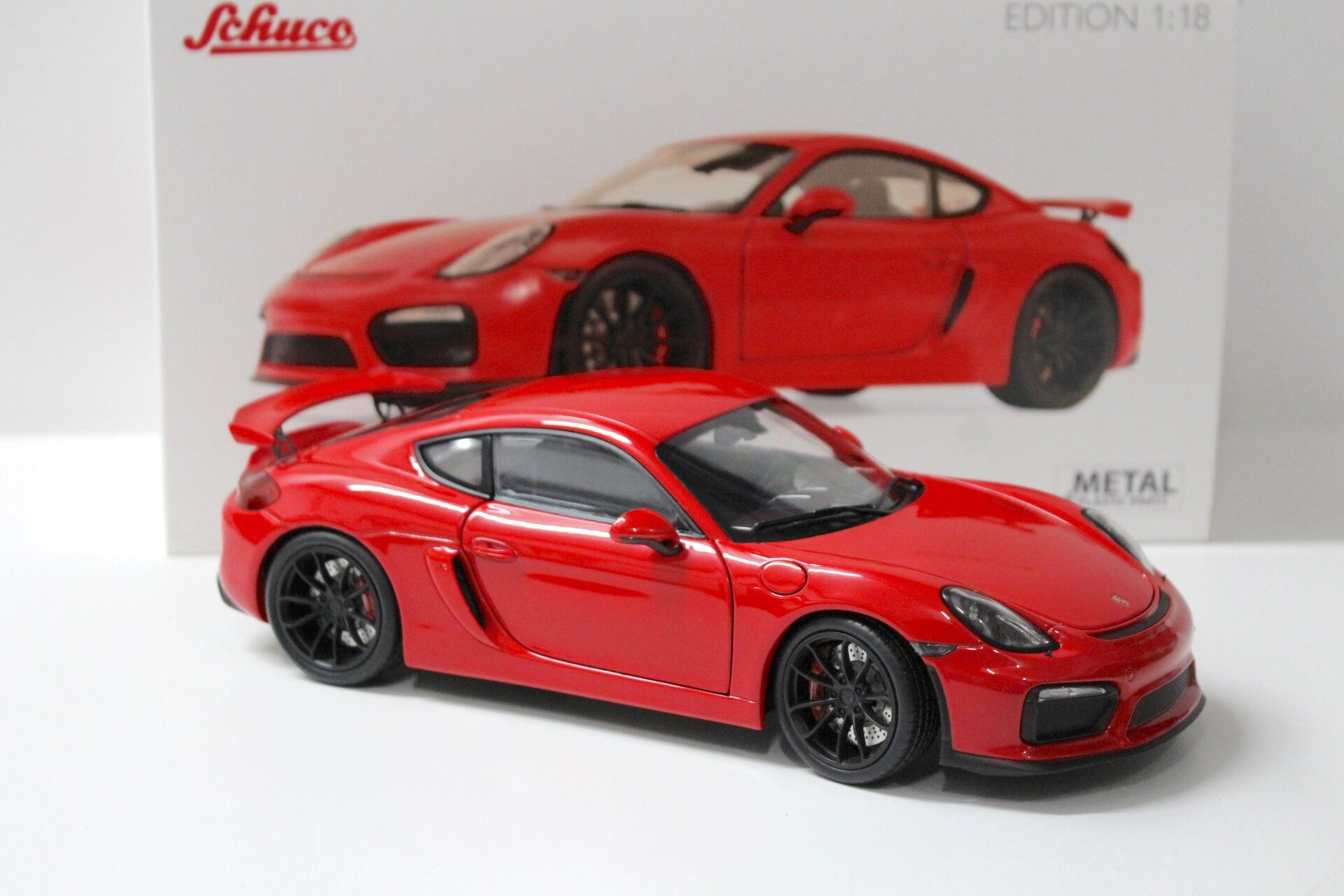 1:18 Schuco Porsche Cayman GT4 Coupe indisch red