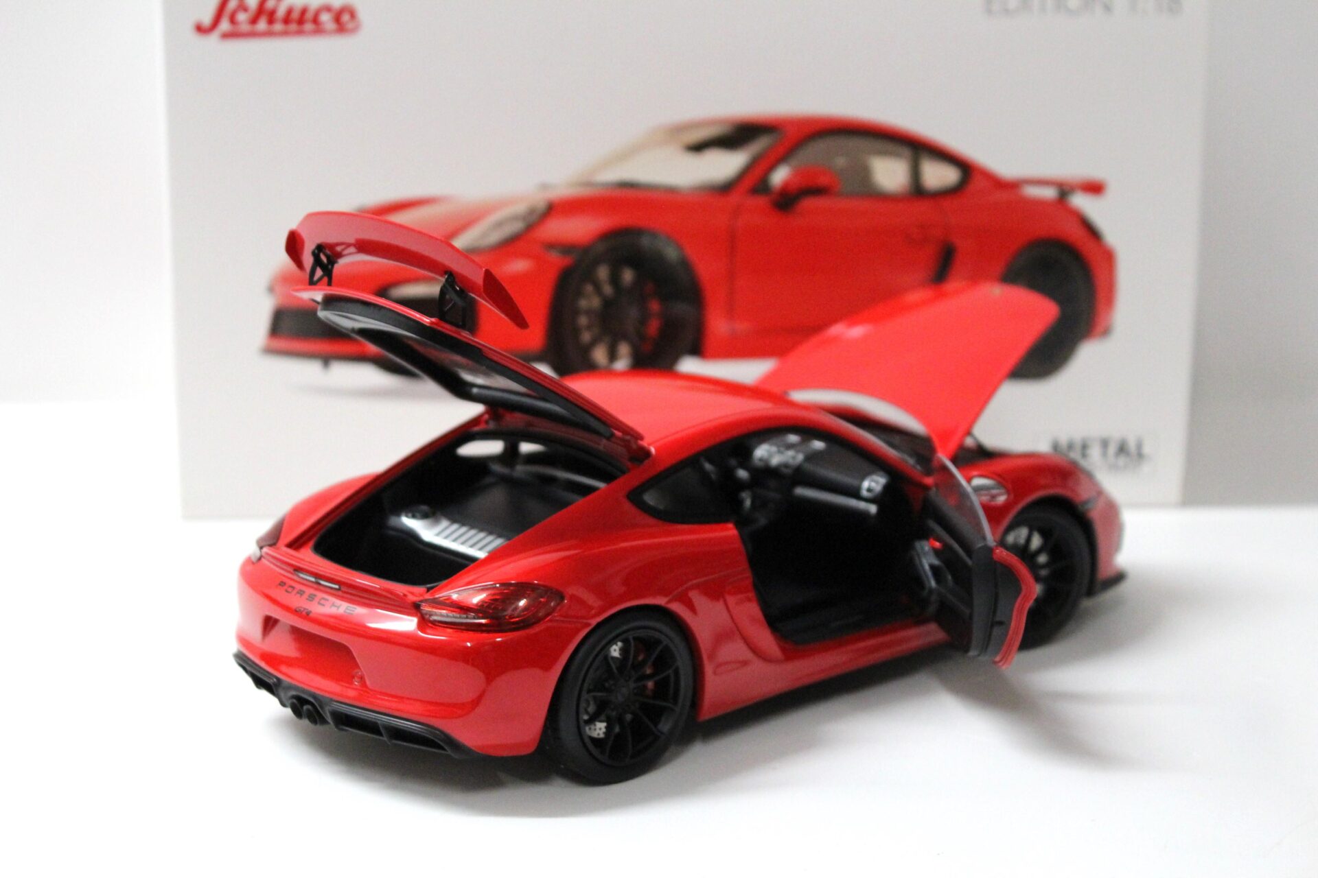 1:18 Schuco Porsche Cayman GT4 Coupe indisch red