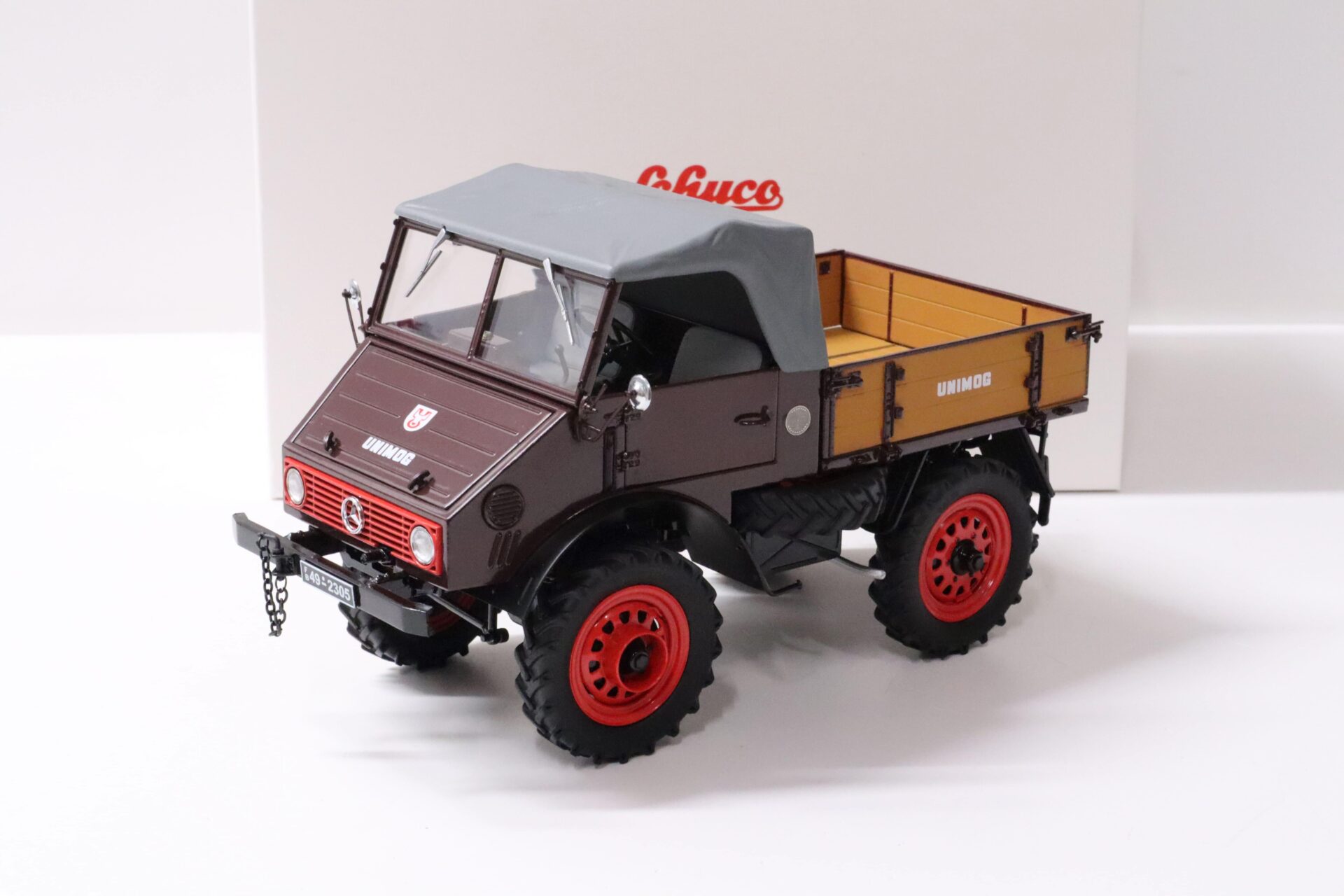 ID 58553 orig.jpg 1:18 Schuco Mercedes Unimog U401 with Softtop 1956 dark red