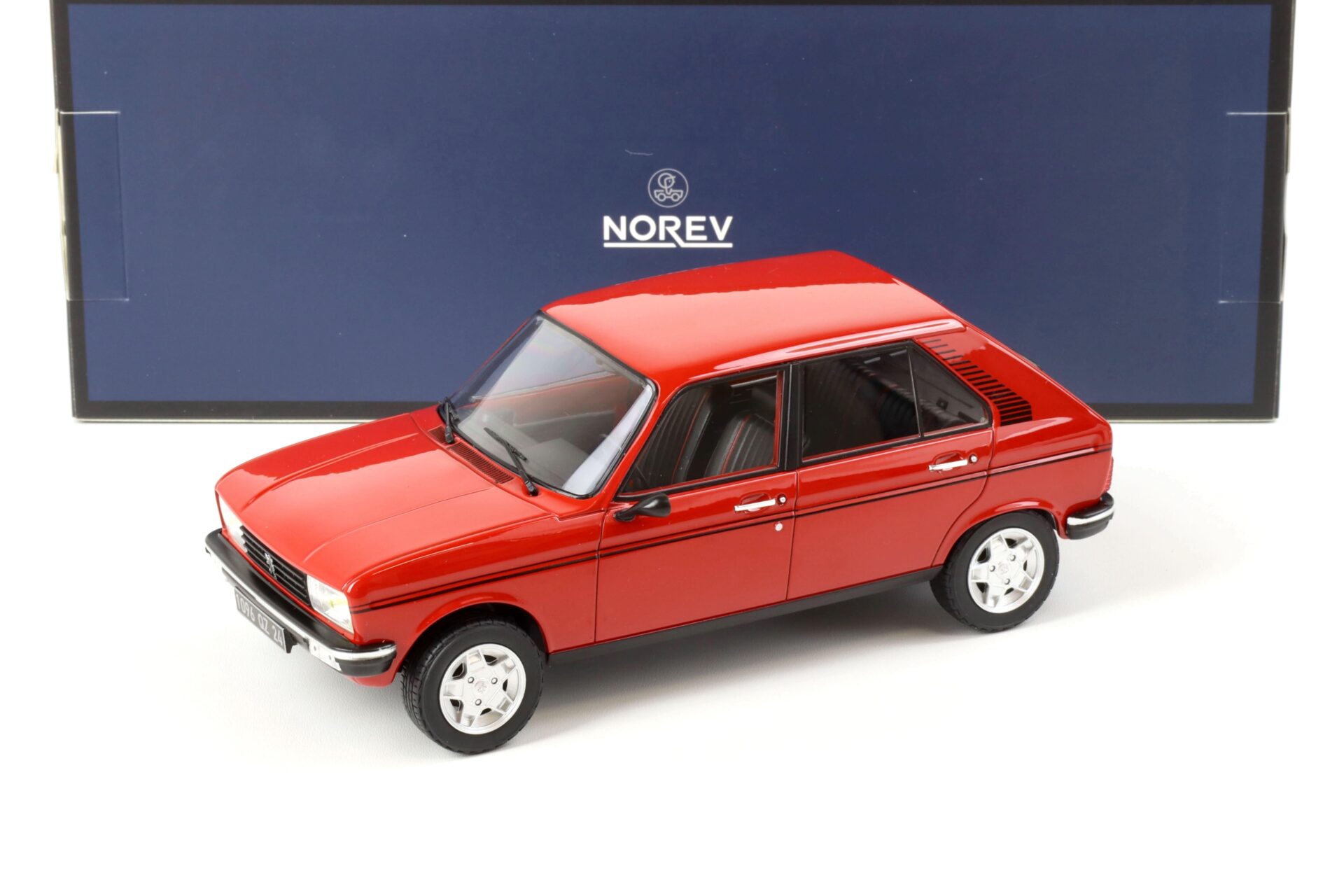 ID 65721 orig.jpg 1:18 Norev Peugeot 104 S 1981 red - Limited Edition 300 pcs.