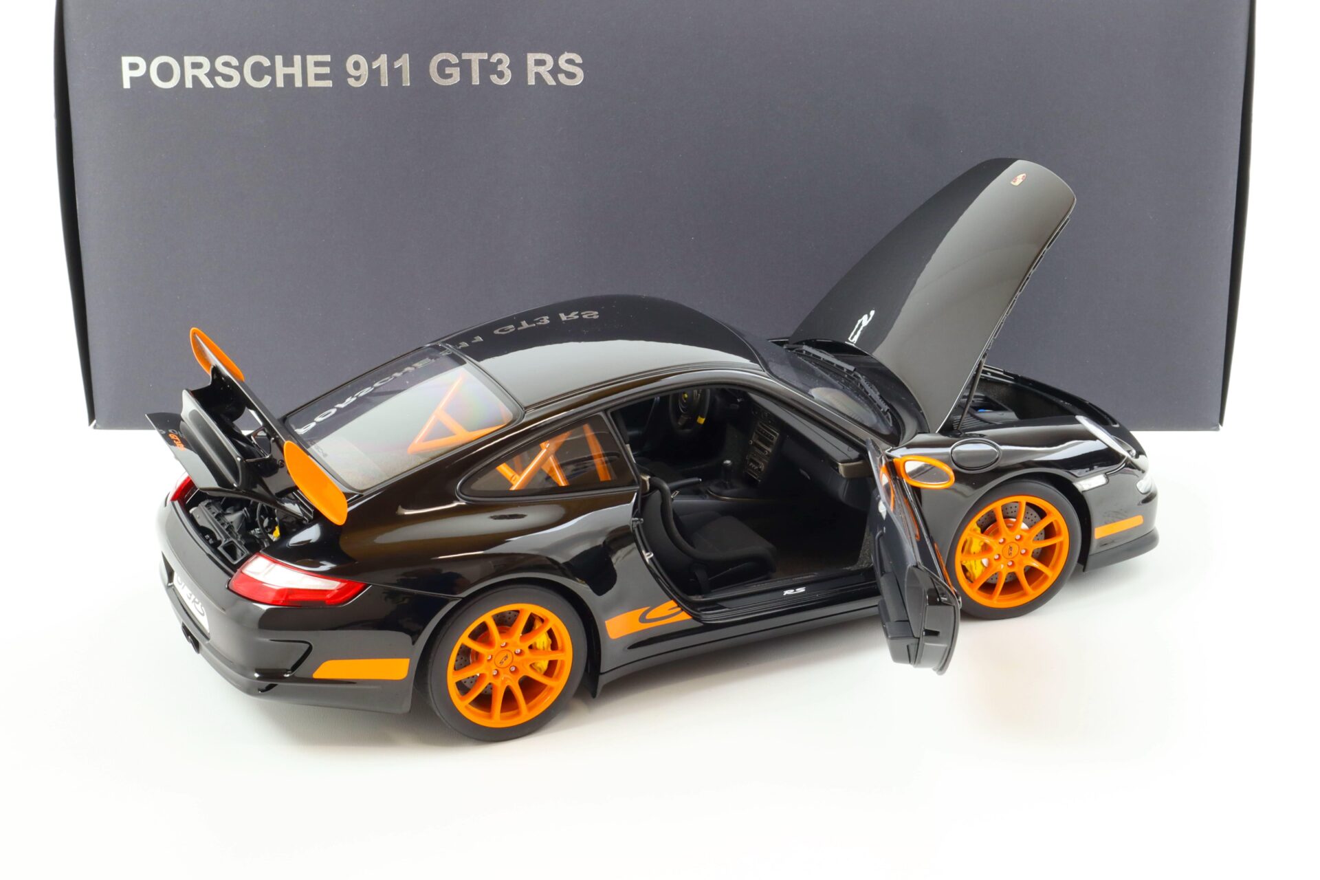 1:12 AUTOart Porsche 911 (997) GT3 RS black with orange stripes 12116