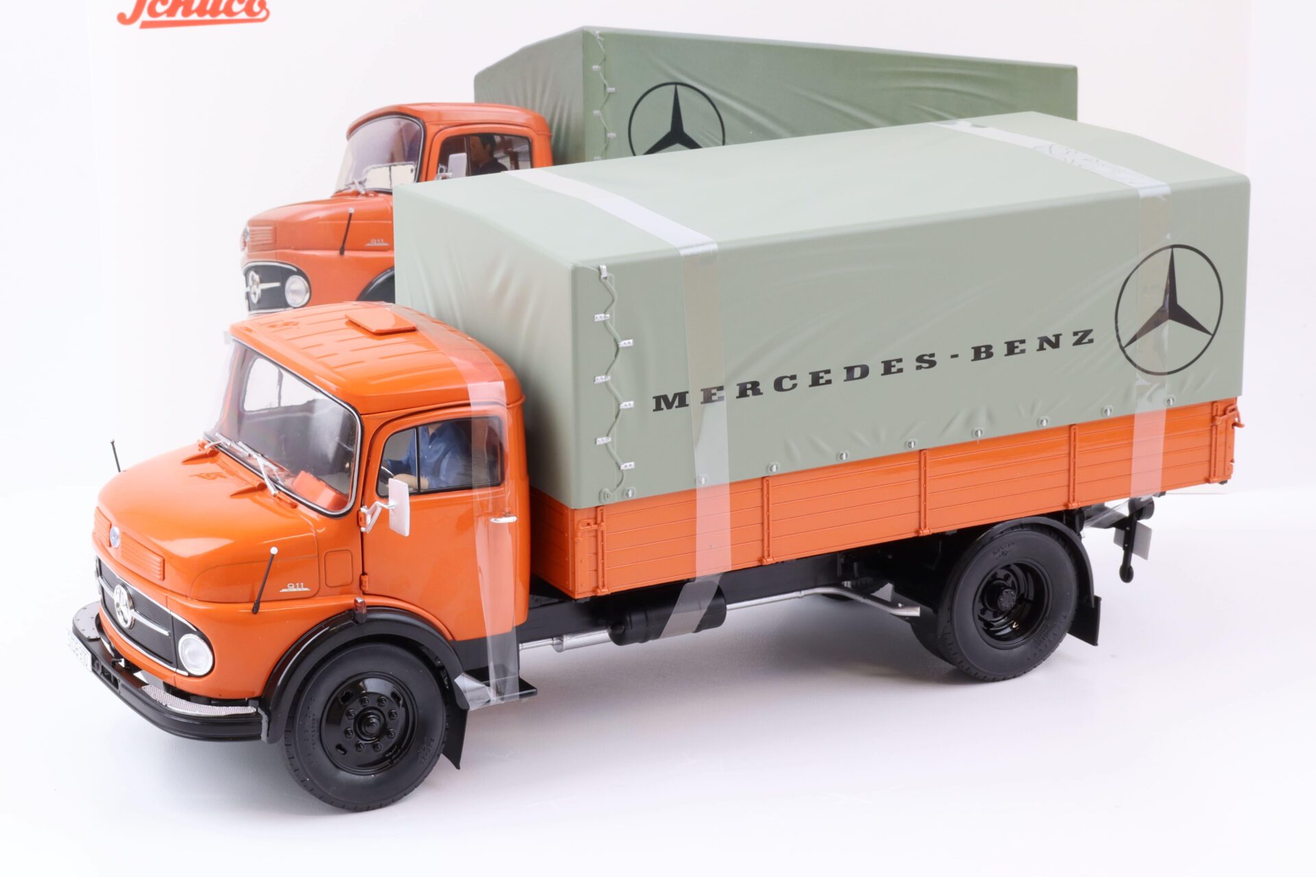 ID 72321 orig.jpg 1:18 Schuco Mercedes L911 Pritsche + Plane LKW MHI Edition orange Die-Cast