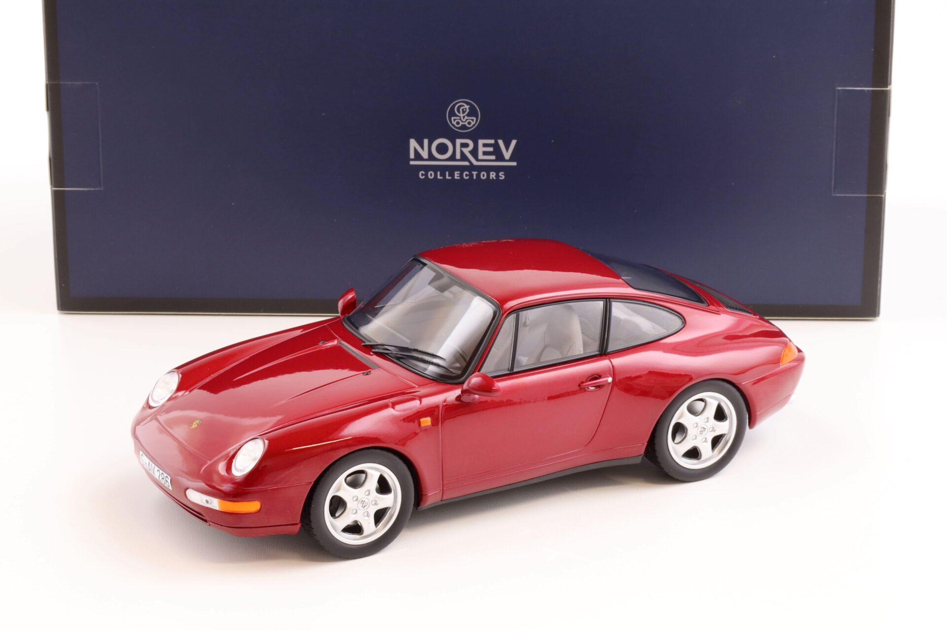 ID 72593 orig.jpg 1:18 Norev Porsche 911 (993) Carrera Coupe 1994 red metallic - Limited 200 pcs.