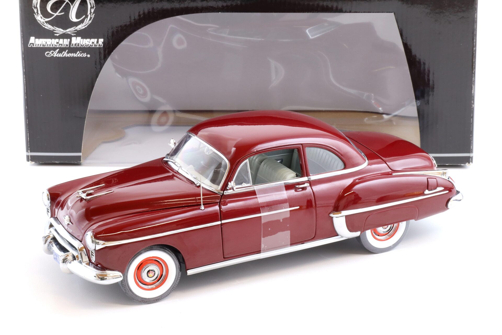 ID 72723 orig 1.jpg 1:18 Ertl Authentics 1950 Oldsmobile dark red