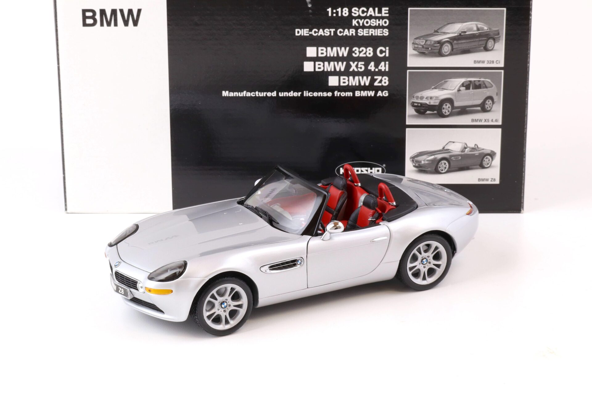 ID 74501 orig.jpg 1:18 Kyosho BMW Z8 Roadster silver/ red with Top 08511S