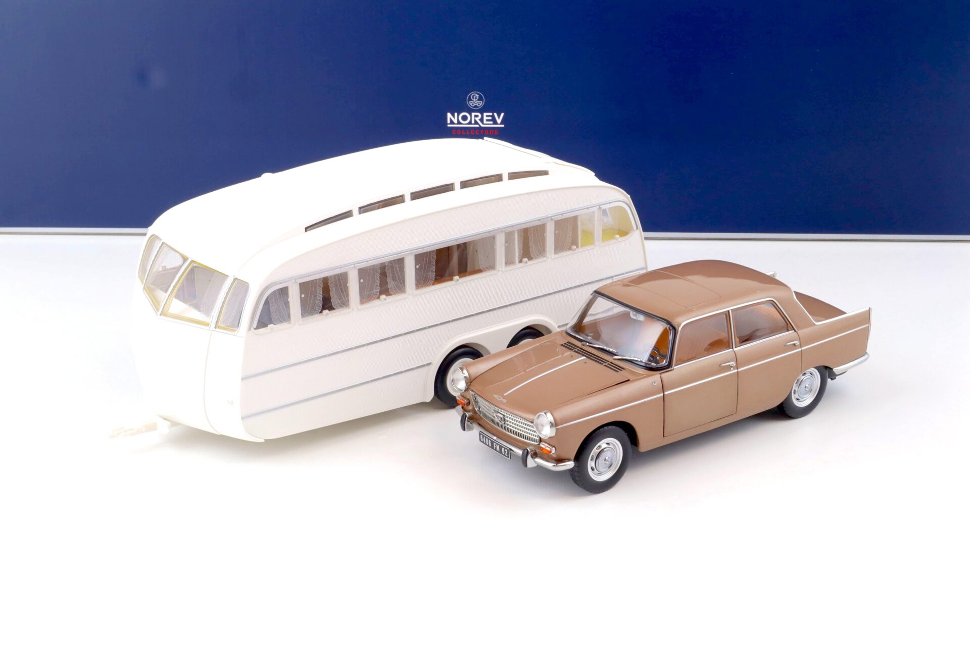 ID 74562 orig.jpg 1:18 Norev Peugeot 404 Sedan 1965 brown metallic with Caravan Henon white 184837