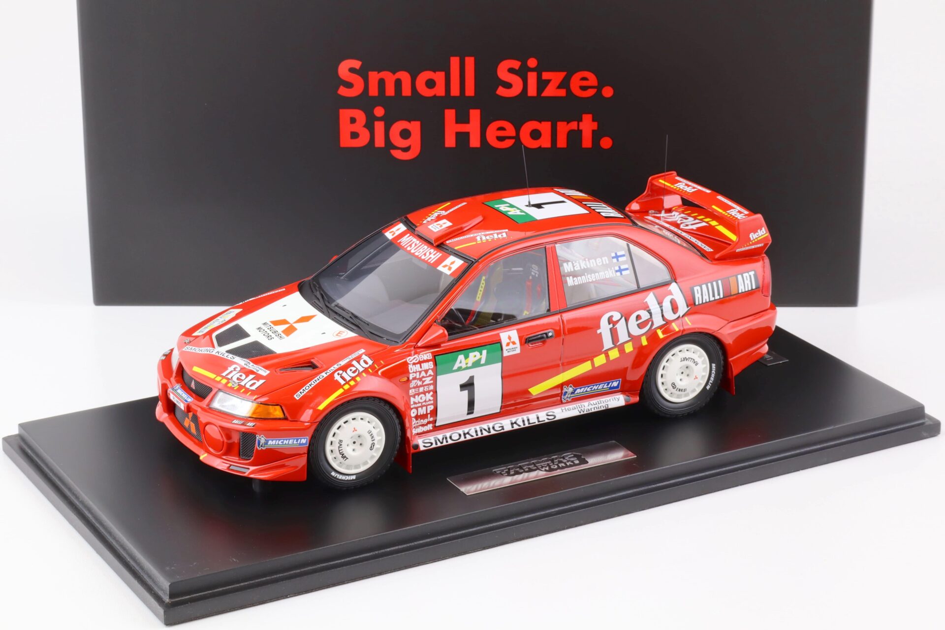 ID 75456 orig.jpg 1:18 Tarmac Works Mitsubishi Lancer Evolution V - #1 Australia Rally Winner 1998