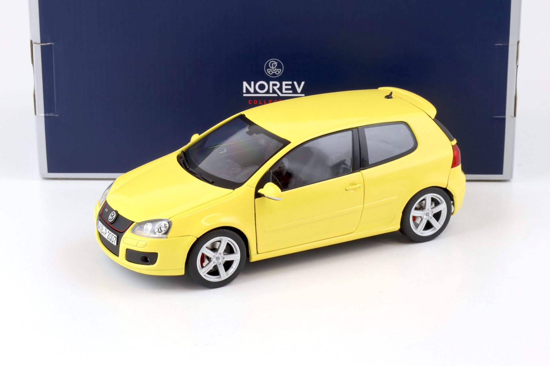 ID 75966 orig.jpg 1:18 Norev VW Golf V GTI Pirelli Edition yellow 2007 - Limited 1000 pcs.