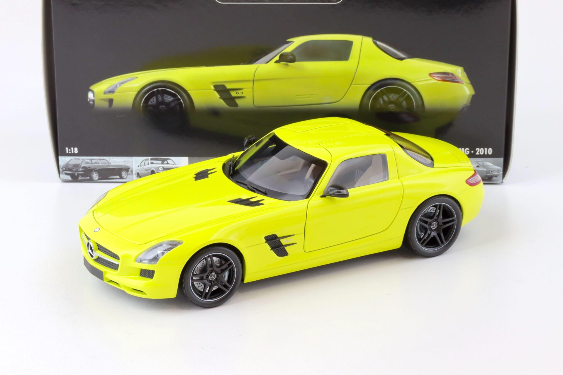 ID 76410 orig 1.jpg 1:18 Minichamps Mercedes SLS AMG Coupe 2010 yellow