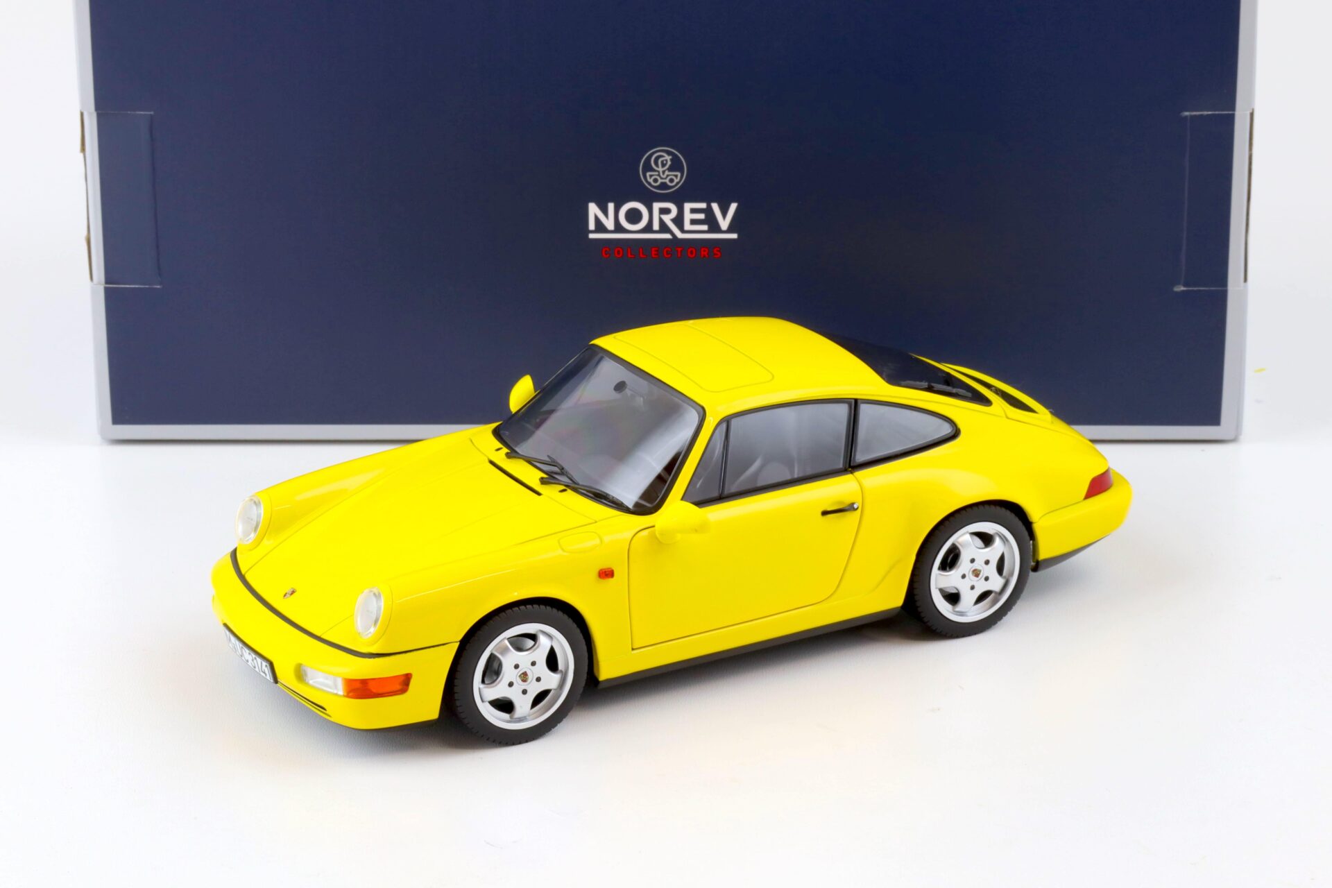 ID 80429 orig.jpg 1:18 Norev Porsche 911 (964) Carrera 2 Coupe 1992 yellow