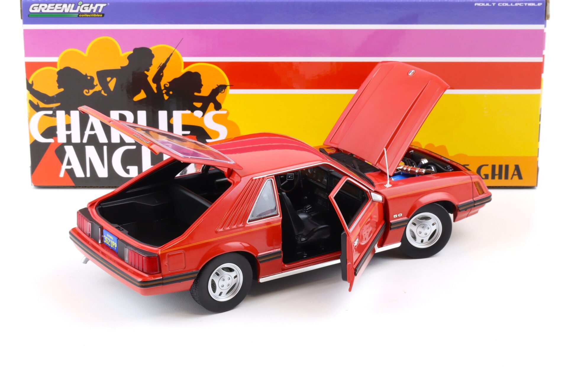 1:18 Greenlight 1979 Ford Mustang Ghia Coupe medium red/ black stripe Charlie´s Angels