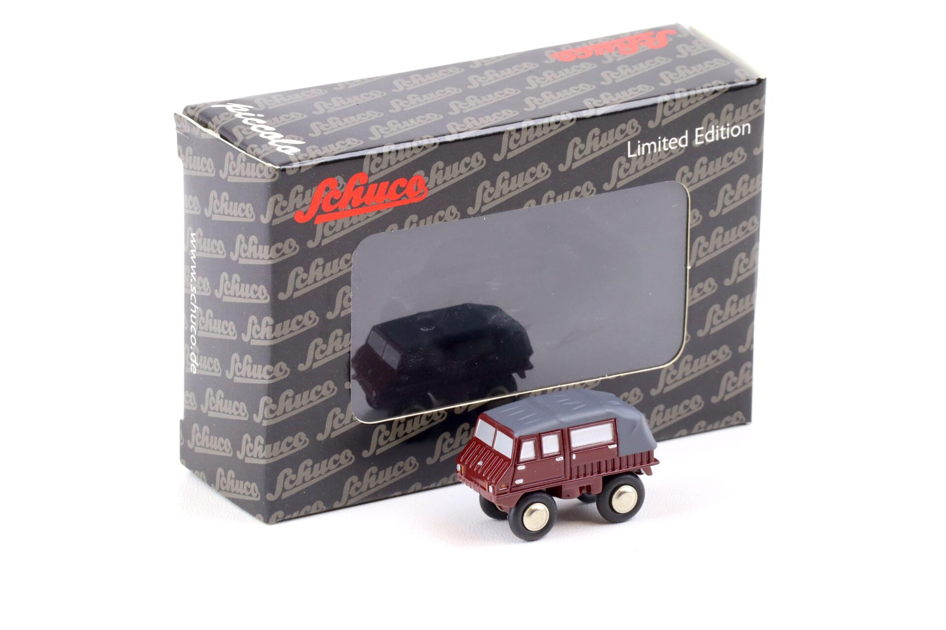 ID 85216 orig.jpg Schuco Piccolo Steyr-Puch Haflinger closed Top dark red