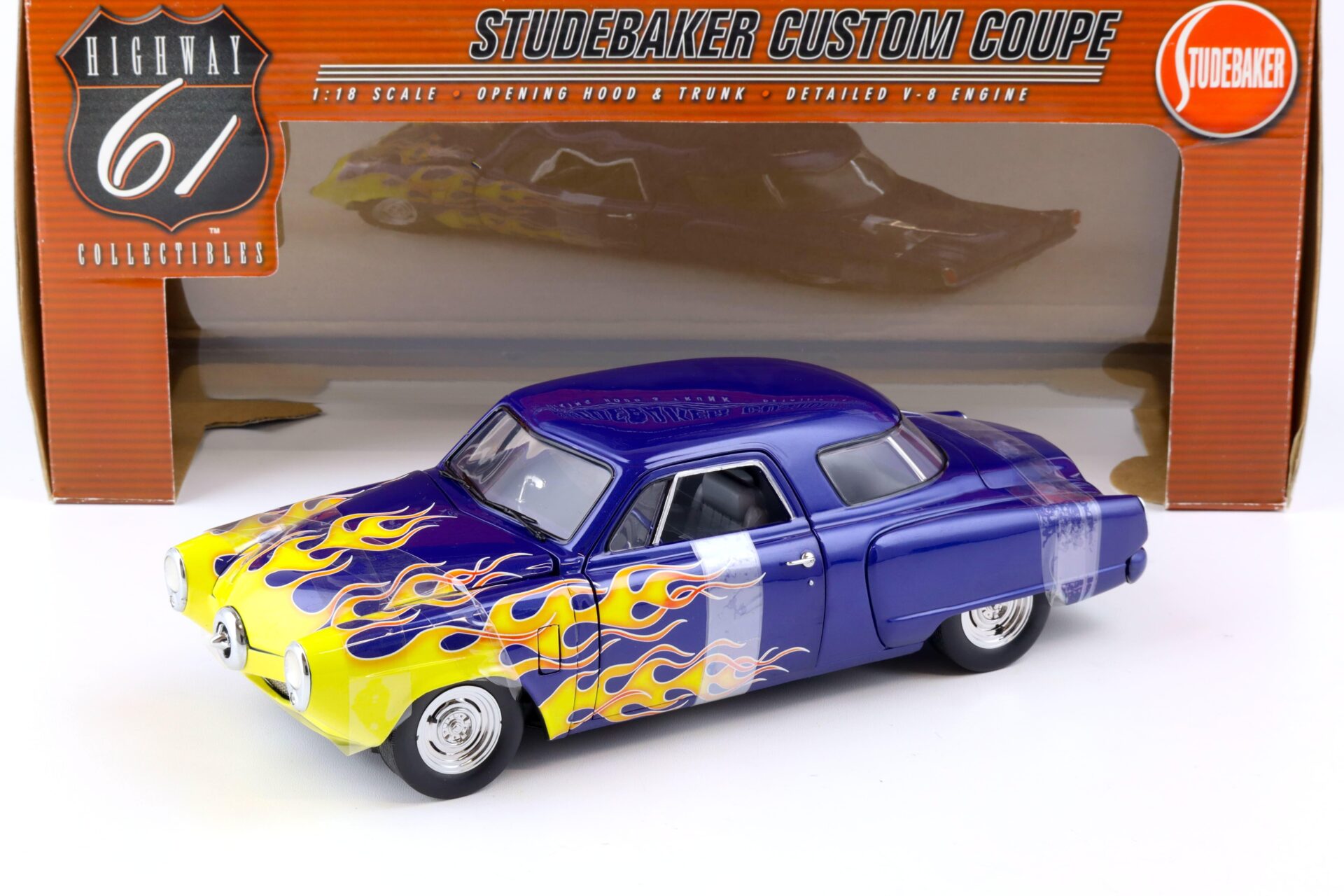 ID 86334 orig.jpg 1:18 Highway61 Studebaker Custom Coupe blue metallic with yellow flames 50125