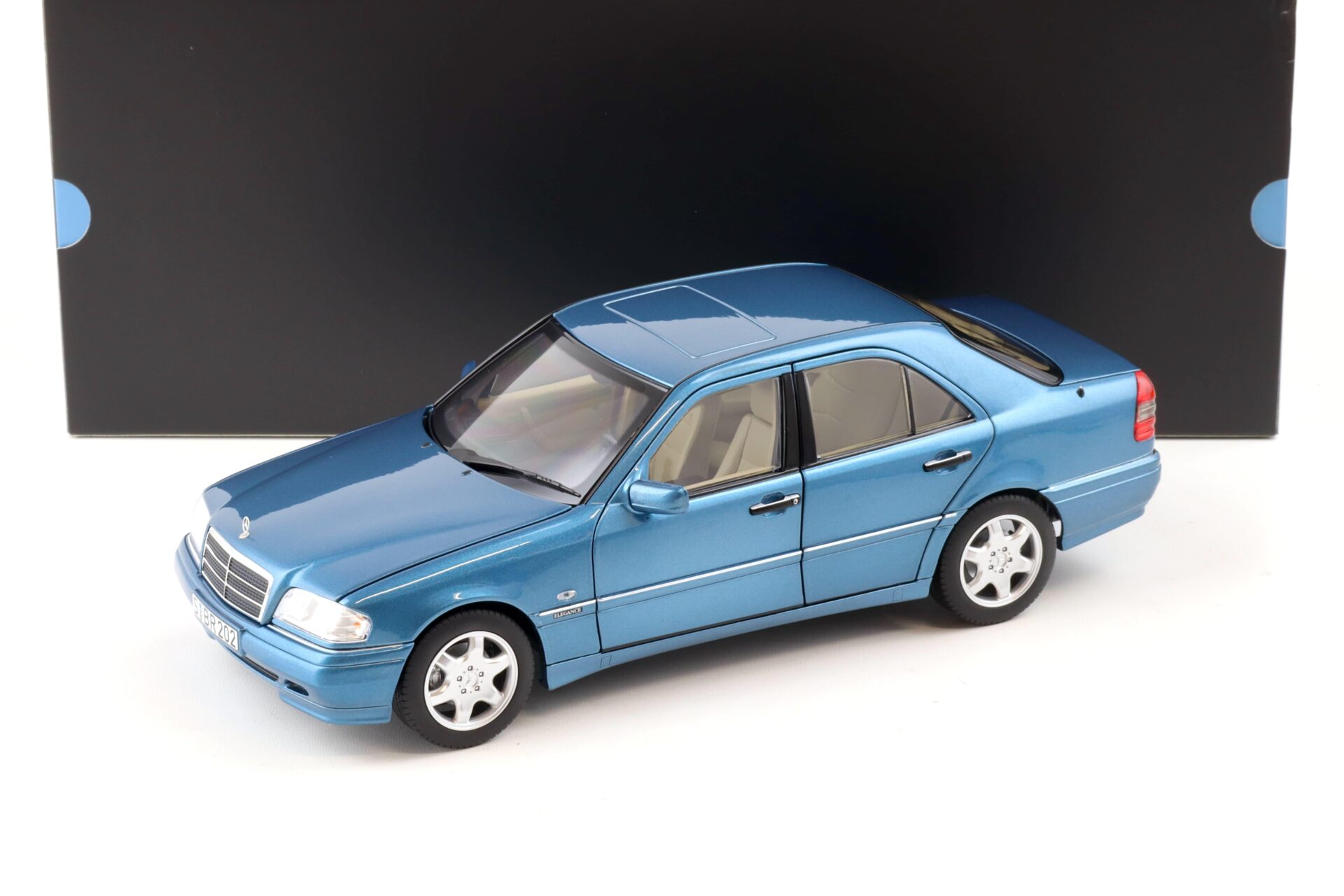 ID 89469 orig.jpg 1:18 Norev Mercedes C200 Limousine C-Class W202 aquamarine blue DEALER VERSION