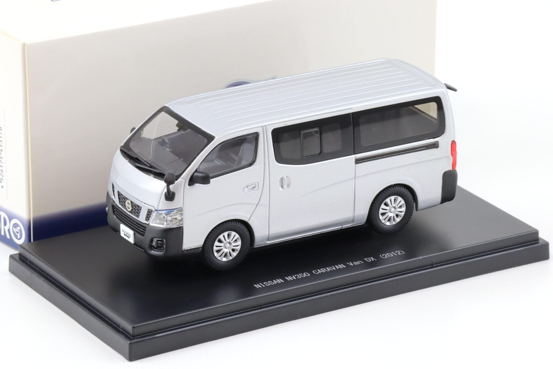 ID 93524 orig.jpg 1:43 Ebbro Nissan NV350 Caravan Van DX 2012 silver metallic