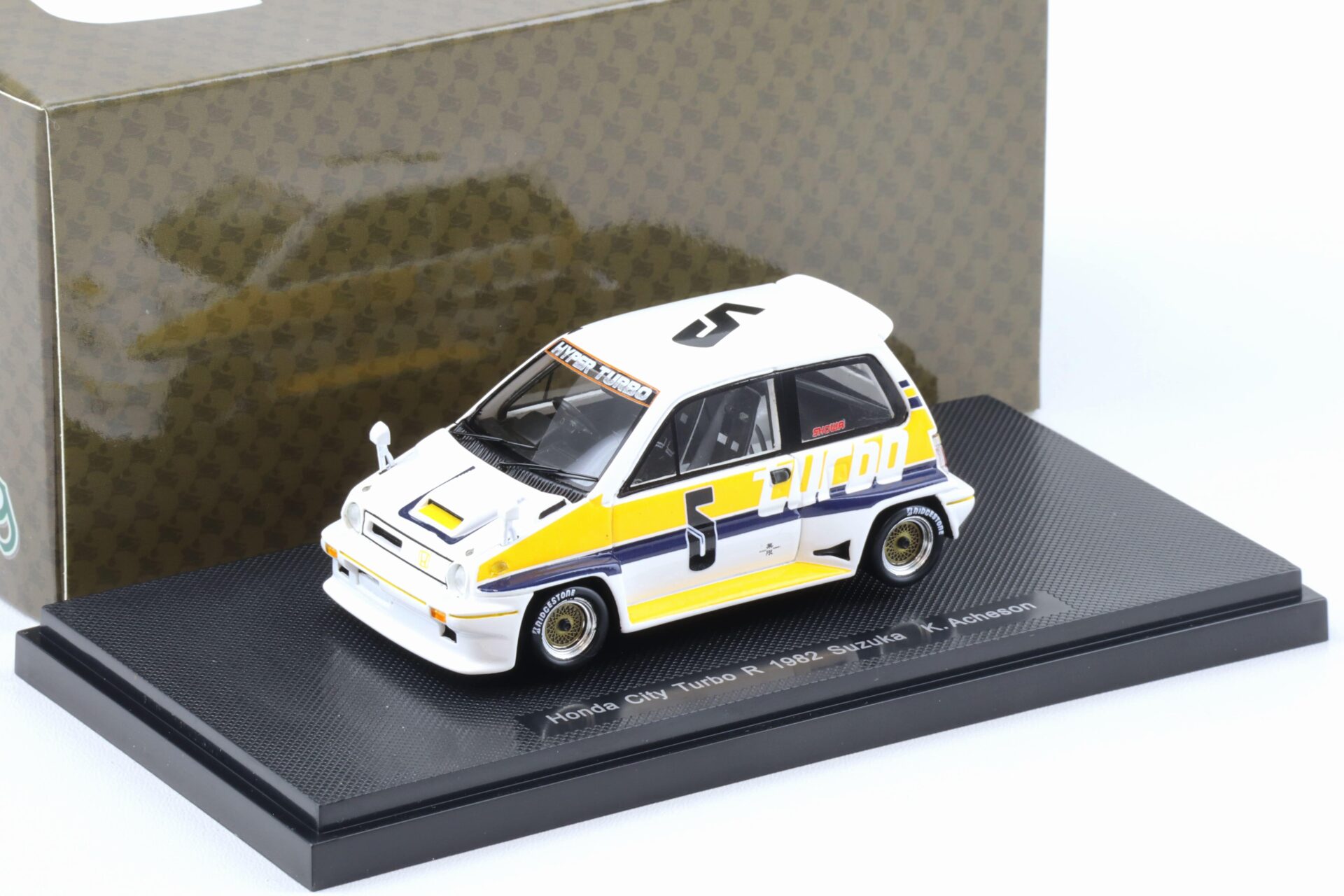 ID 93885 orig.jpg 1:43 Ebbro Honda City Turbo R 1982 Suzuka K.Acheson #5 white/ yellow