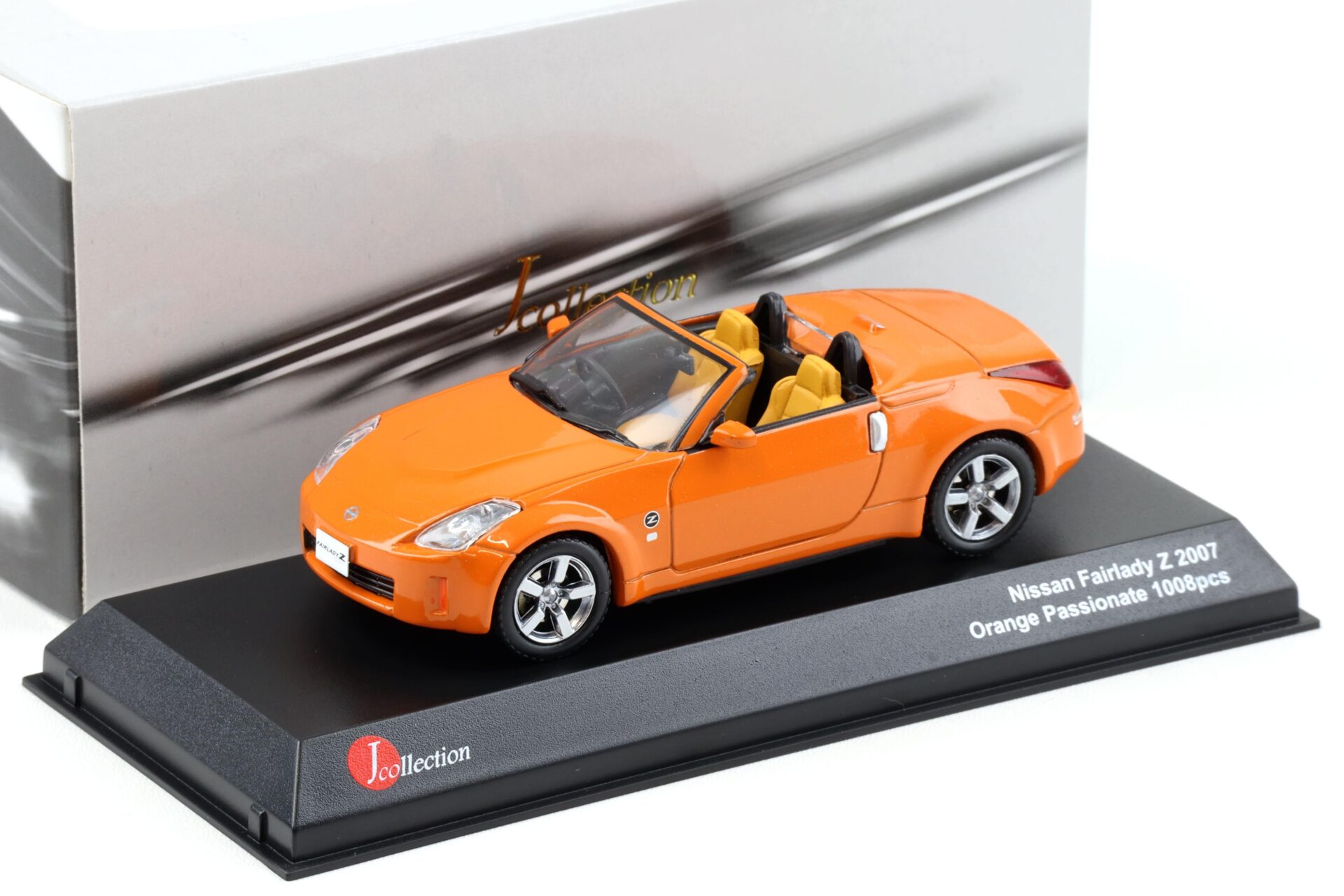 ID 94759 orig.jpg 1:43 J-Collection Kyosho Nissan Fairlady Z 2007 orange passionate