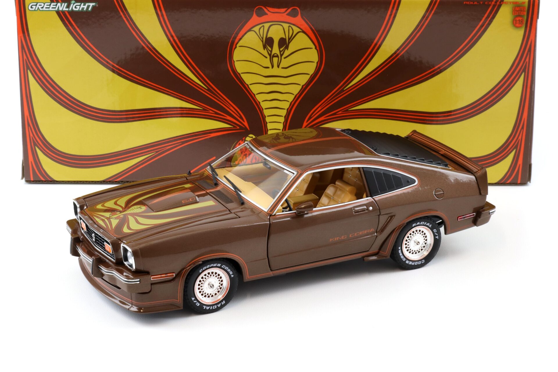 ID 97802 orig.jpg 1:18 Greenlight 1978 Ford Mustang II King Cobra brown metallic/ orange-gold stripes